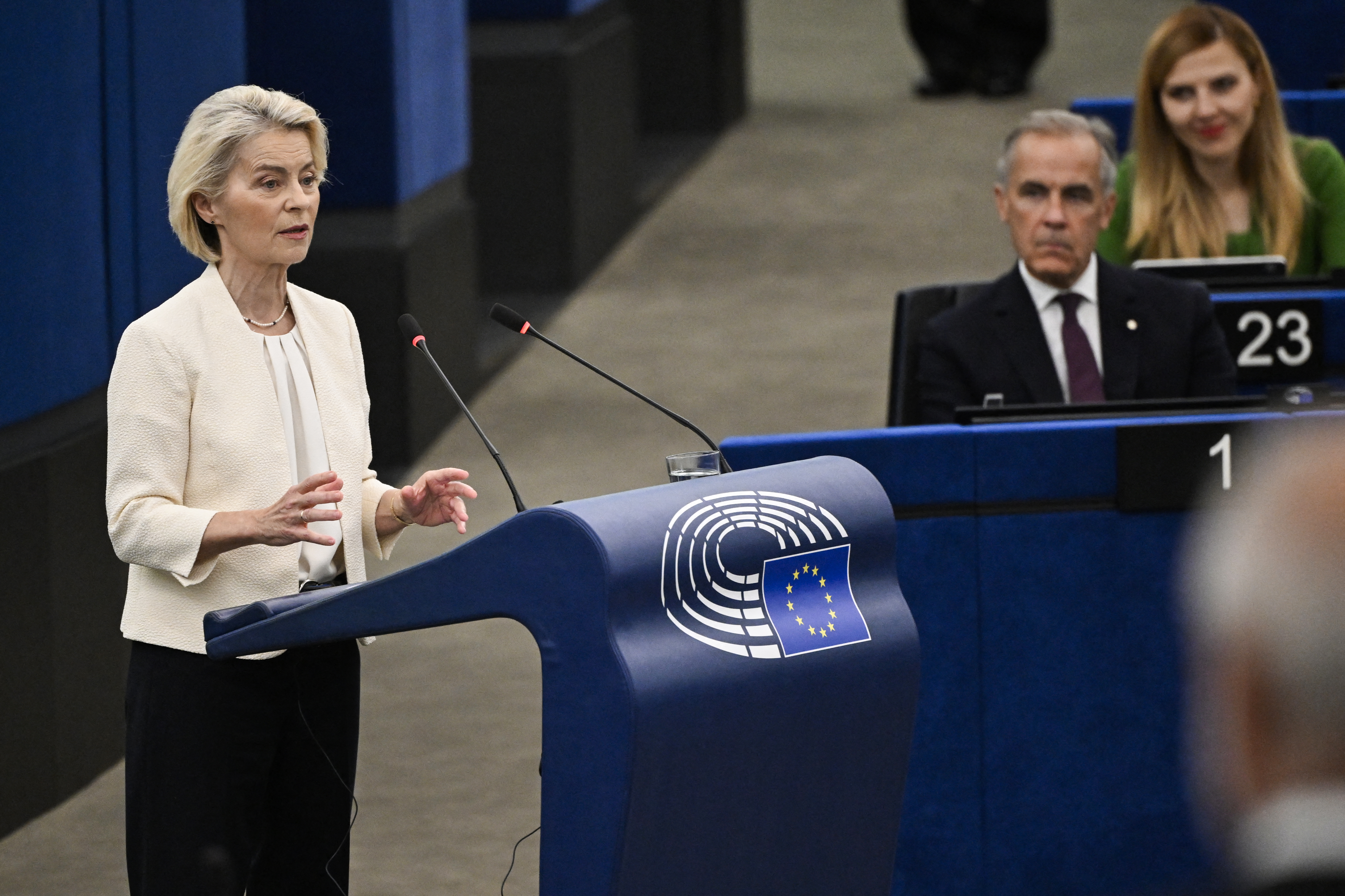 European Commission President Ursula von der Leyen delivers a speech near Canada's Prime Minister Mark Carney (2R) during her annual State of the Union address at a plenary session of the European Parliament in Strasbourg, eastern France on September 16, 2026.