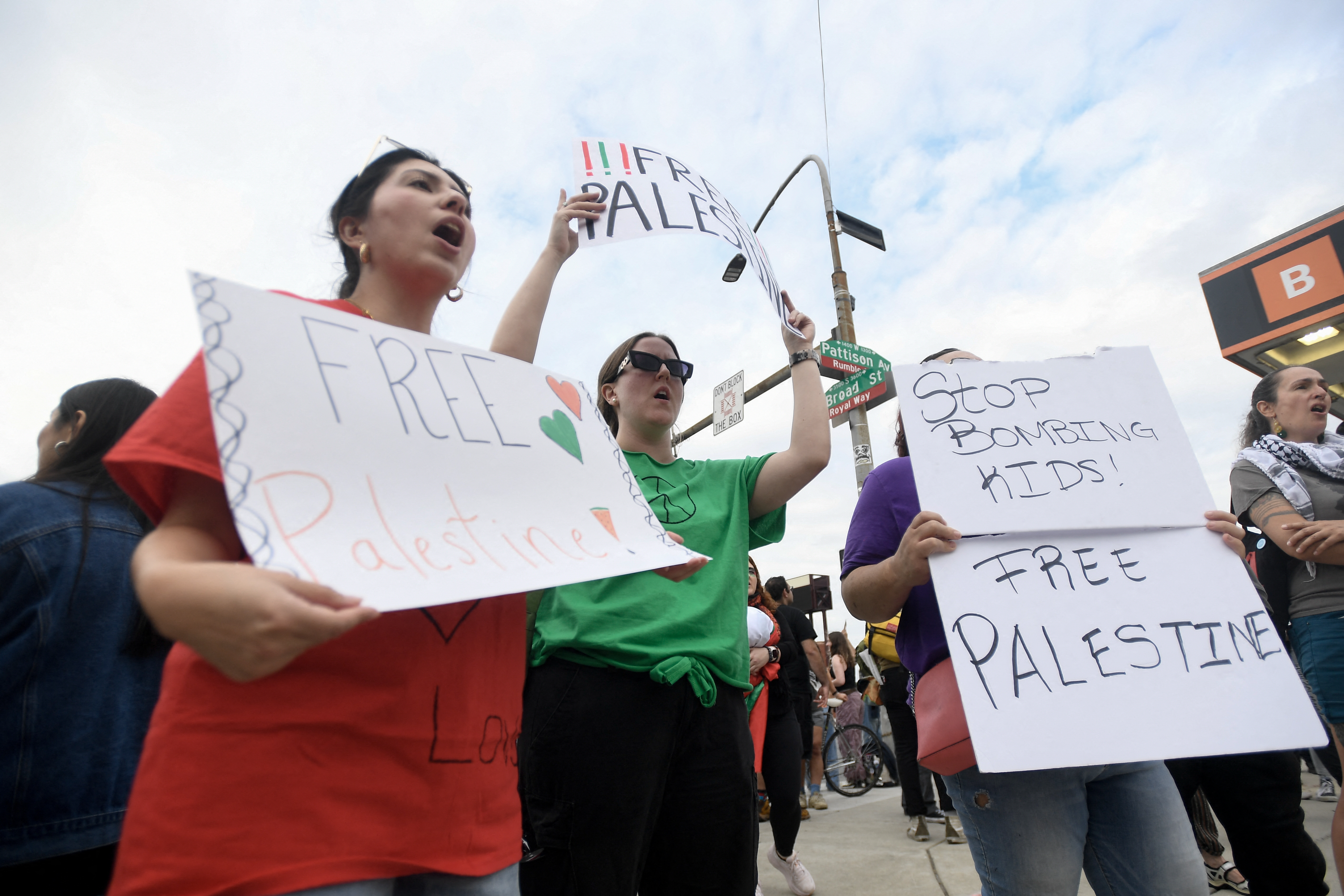 Pro-Palestinian protesters hold flags and signs outside Lincoln Financial Field in Philadelphia