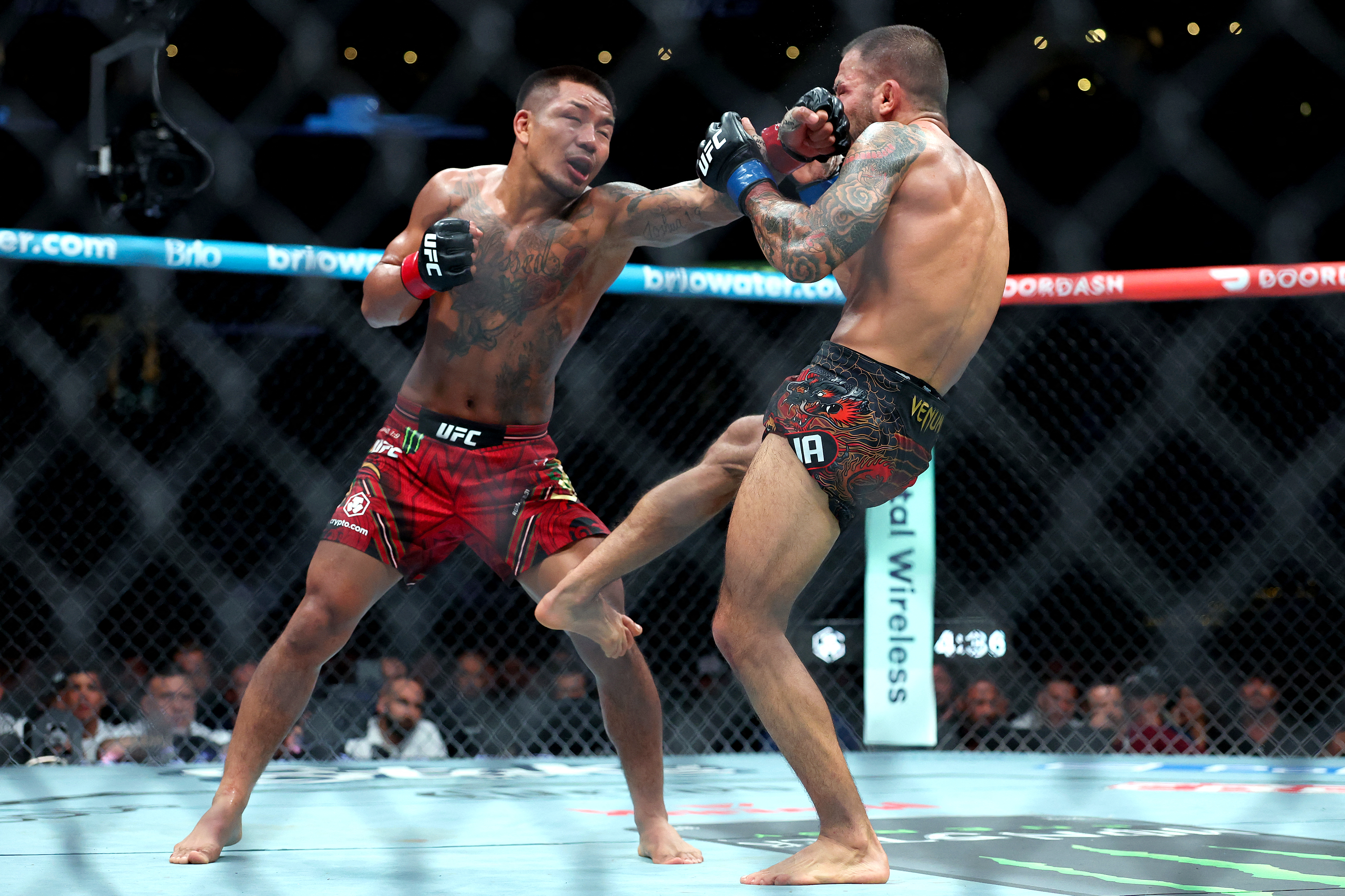 LOS ANGELES, CALIFORNIA - SEPTEMBER 19: Joshua Van of Myanmar punches Alexandre Pantoja of Brazil in their Flyweight Championship bout during UFC 331: Van v Pantoja 2 at Crypto.com Arena on September 19, 2026 in Los Angeles, California. Luke Hales/Getty Images/AFP (Photo by Luke Hales / GETTY IMAGES NORTH AMERICA / Getty Images via AFP)