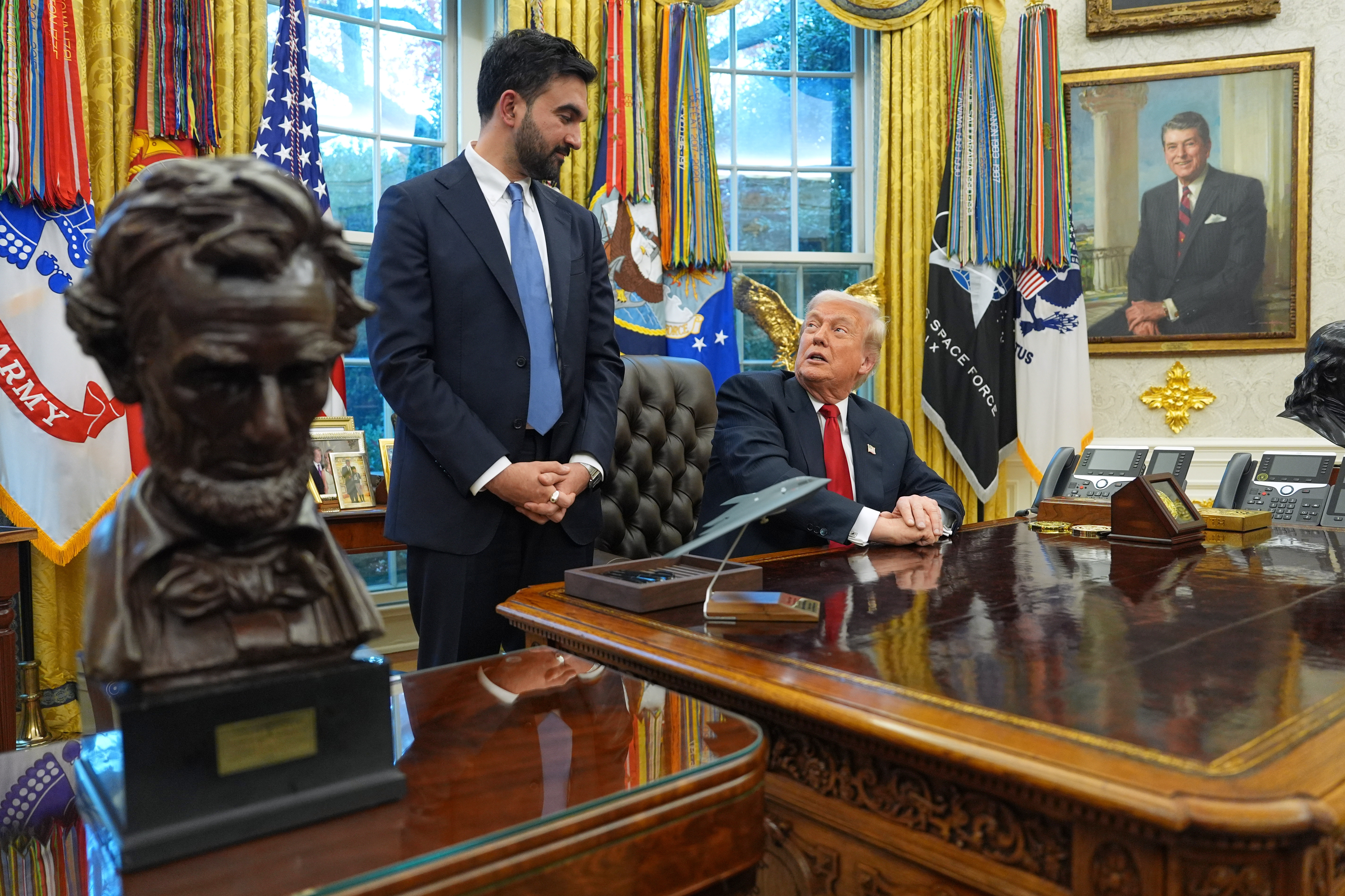 President Donald Trump talks after meeting with New York City Mayor-elect Zohran Mamdani in the Oval Office of the White House, Friday, Nov. 21, 2025, in Washington. (AP Photo/Evan Vucci)