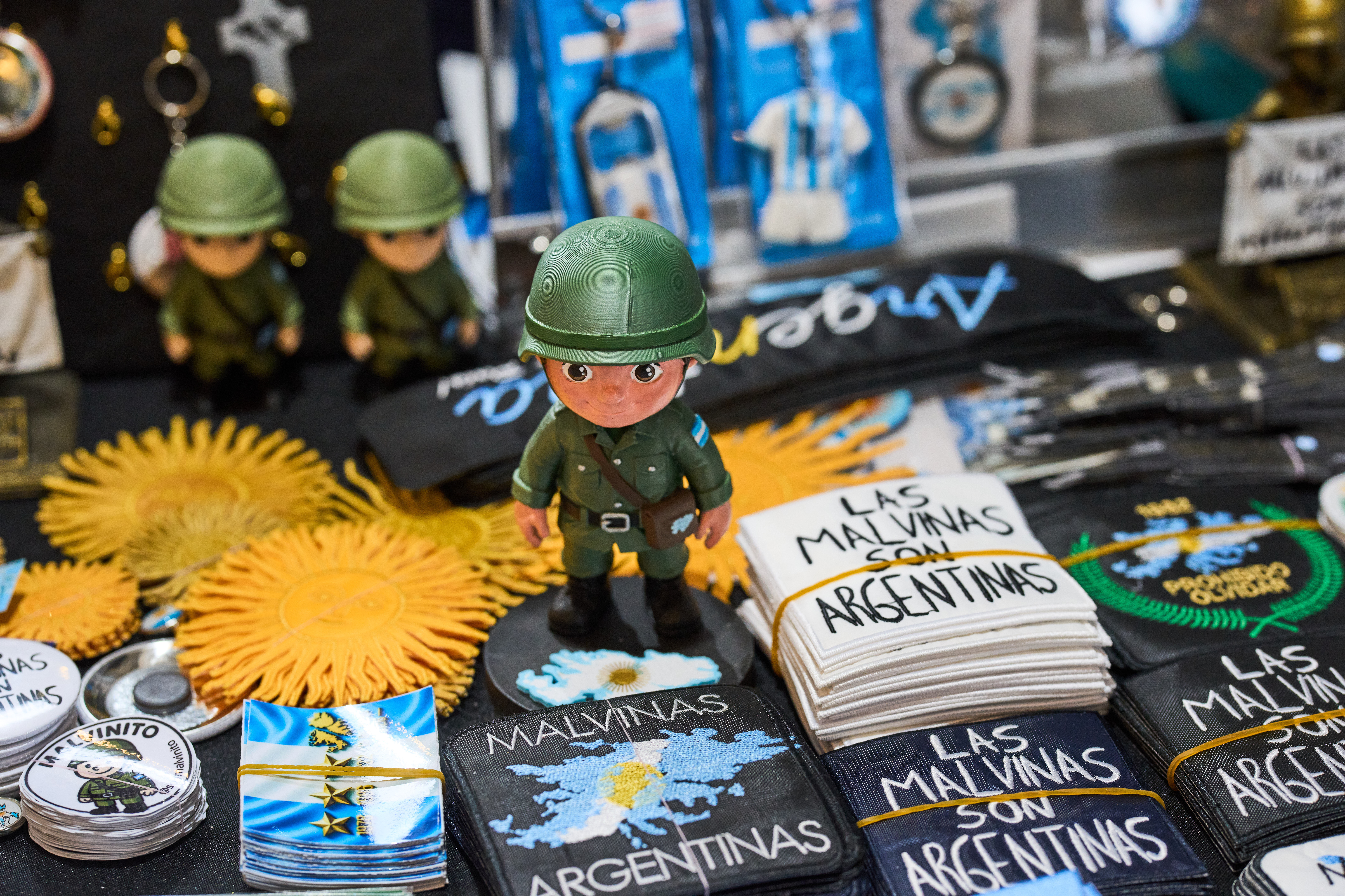 Magnets that read in Spanish, "The Malvinas are Argentine," referring to the Falkland Islands, are displayed for sale during an annual hunting, fishing and outdoors fair in Buenos Aires, Argentina, on August 14, 2026 [File: Rodrigo Abd/AP Photo]