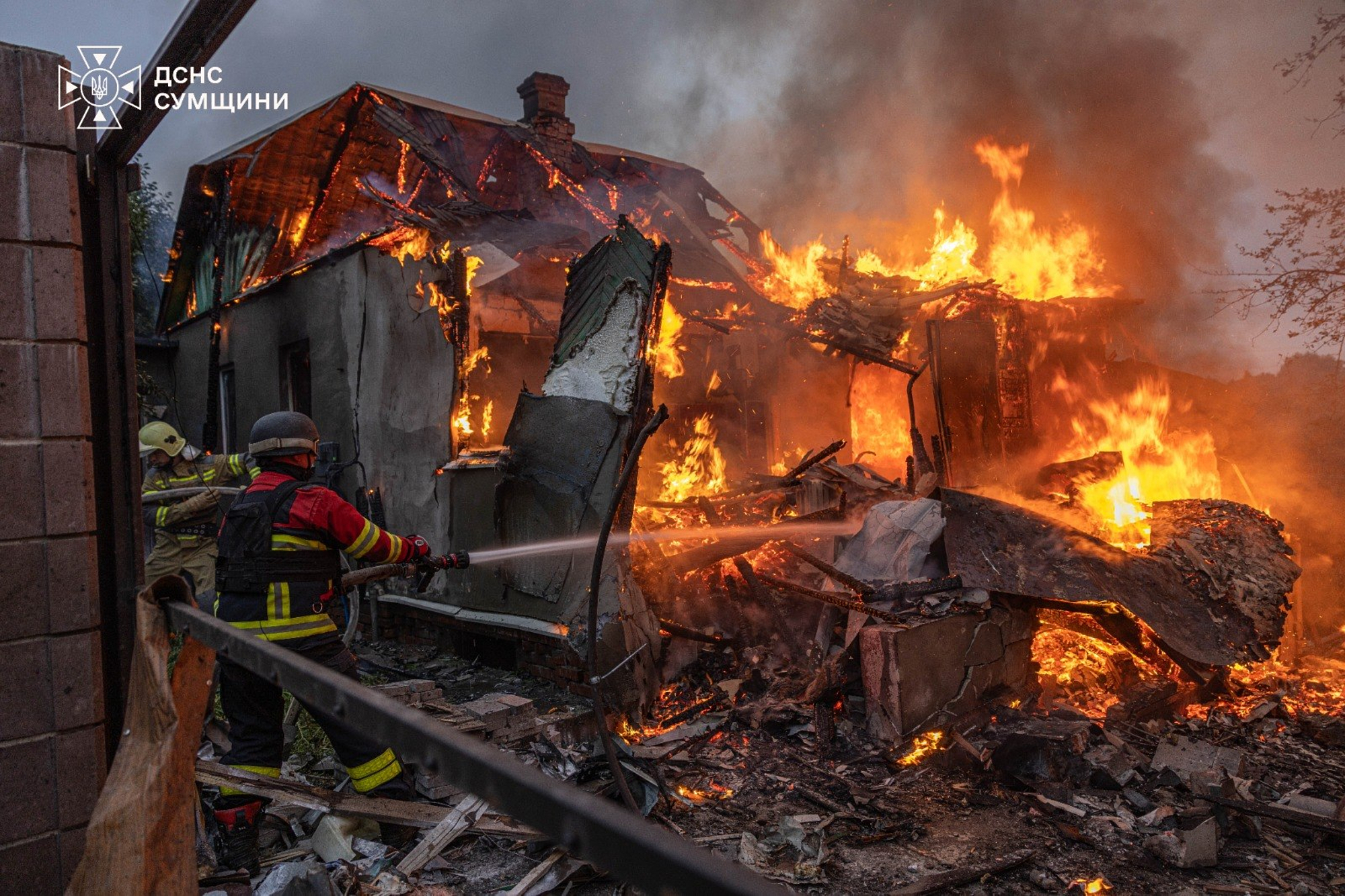 Ukrainian firefighters put out a fire at private homes following a Russian air attack in Sumy, Ukraine on September 16, 2026.