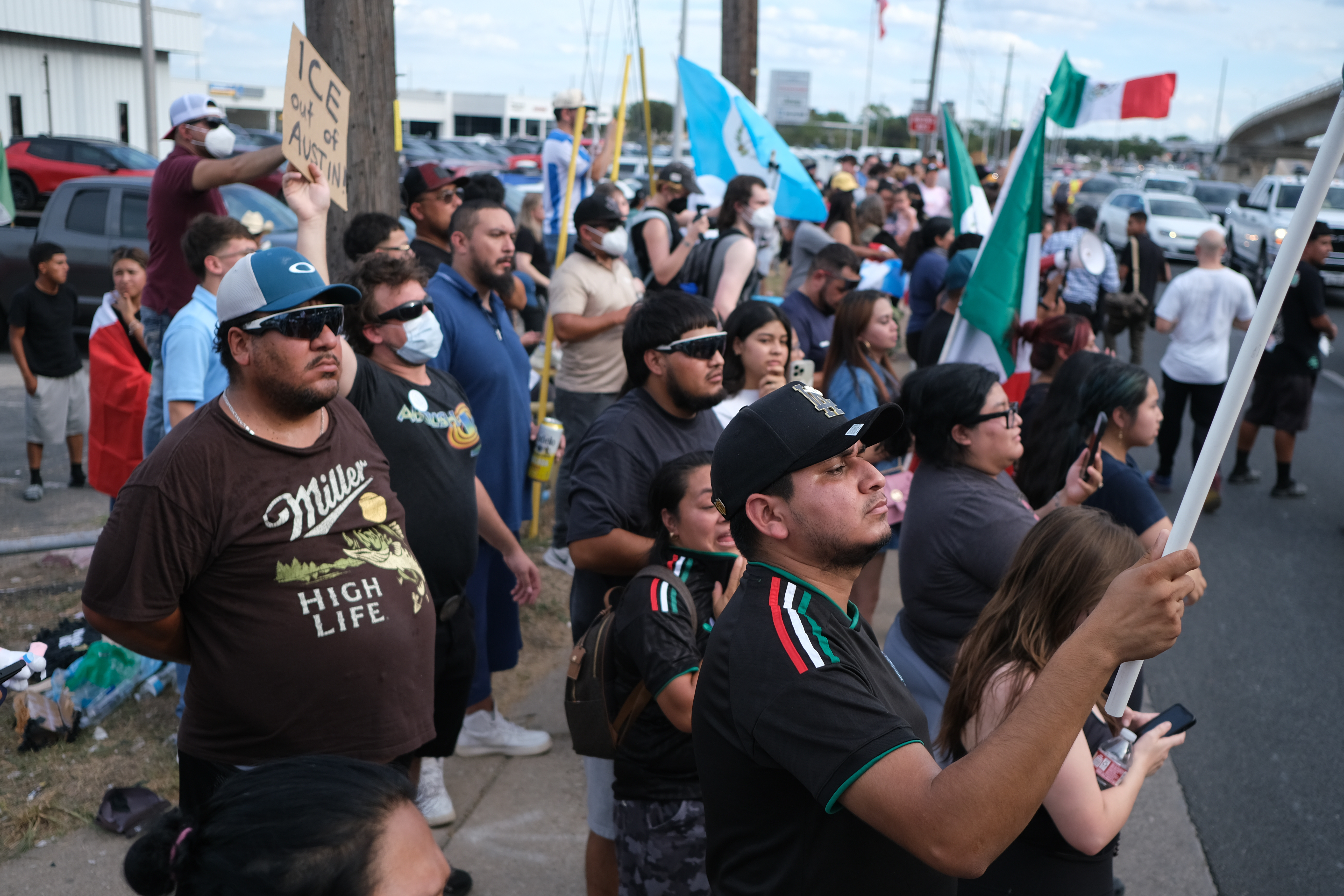 Protesters gather at the site of an ICE shooting in Austin, Texas