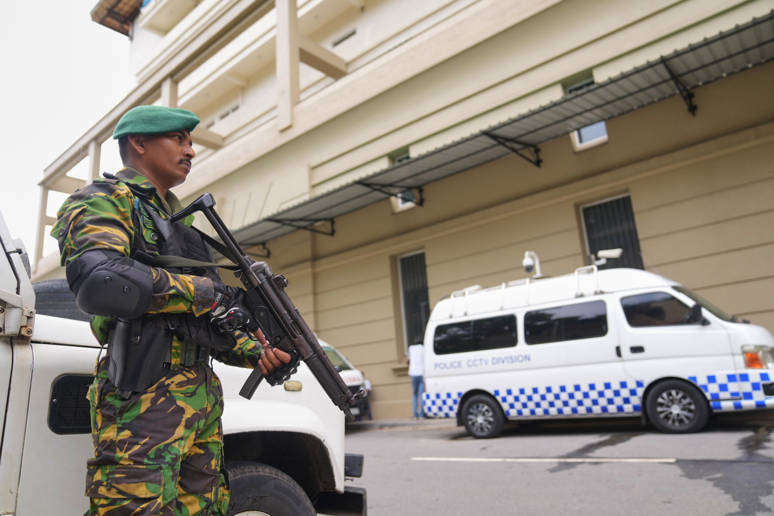 A police commando stands guard at the High Court complex ahead of a verdict related to the 2019 Easter bombings in Colombo, Sri Lanka on September 22, 2026.
