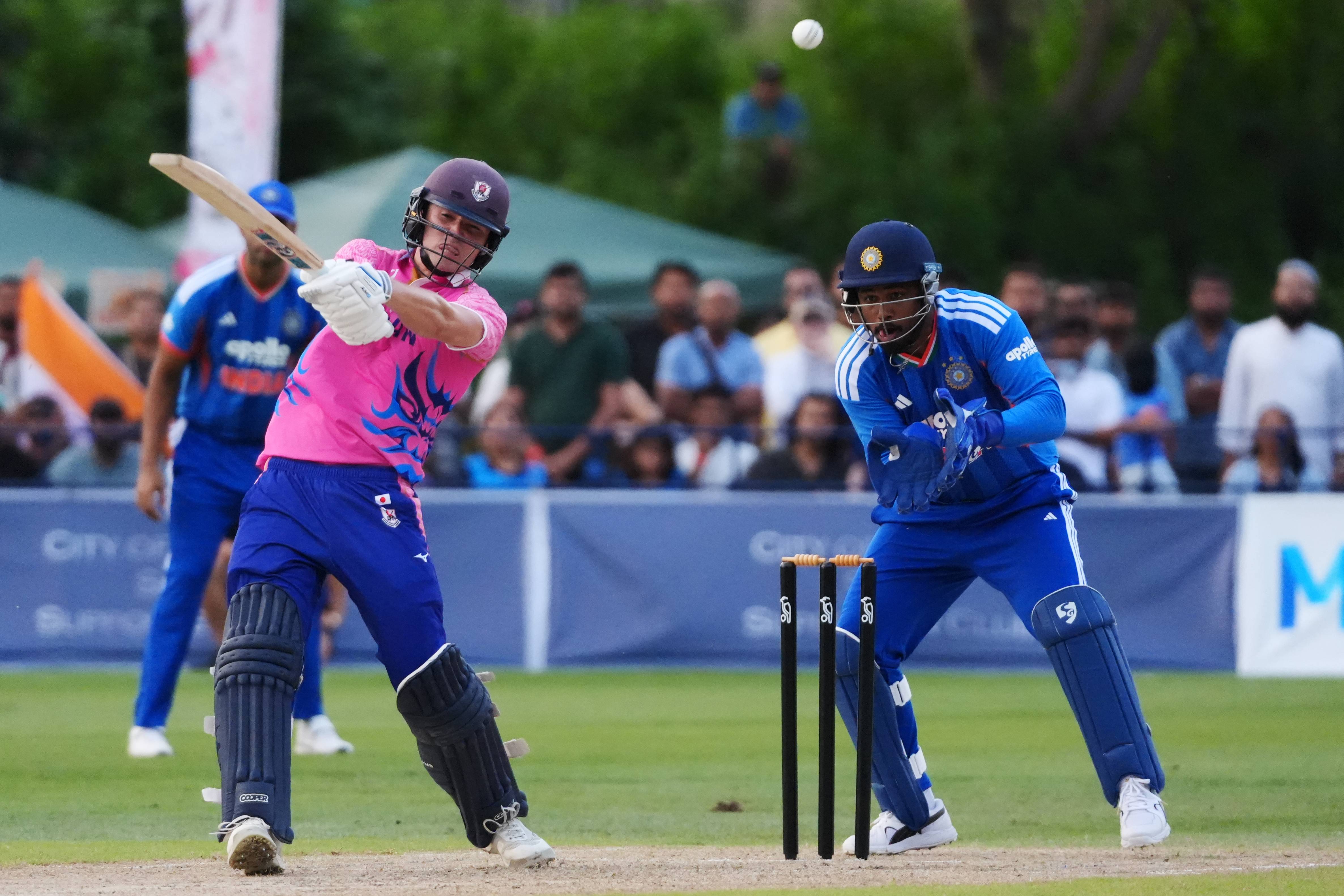 Japan's Kendel Kadowaki-Fleming bats in front of India's Ishan Kishan in Sano