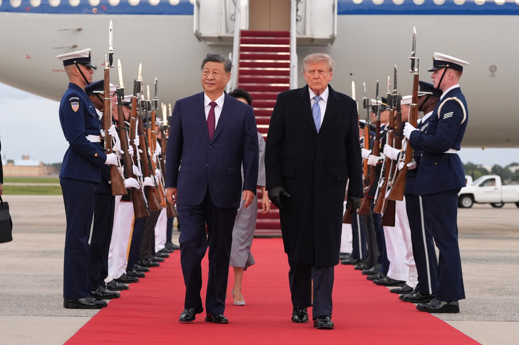 President Donald Trump and first lady Melania Trump walk with China's President Xi Jinping and his wife Peng Liyuan at Joint Base Andrews, Md., USA