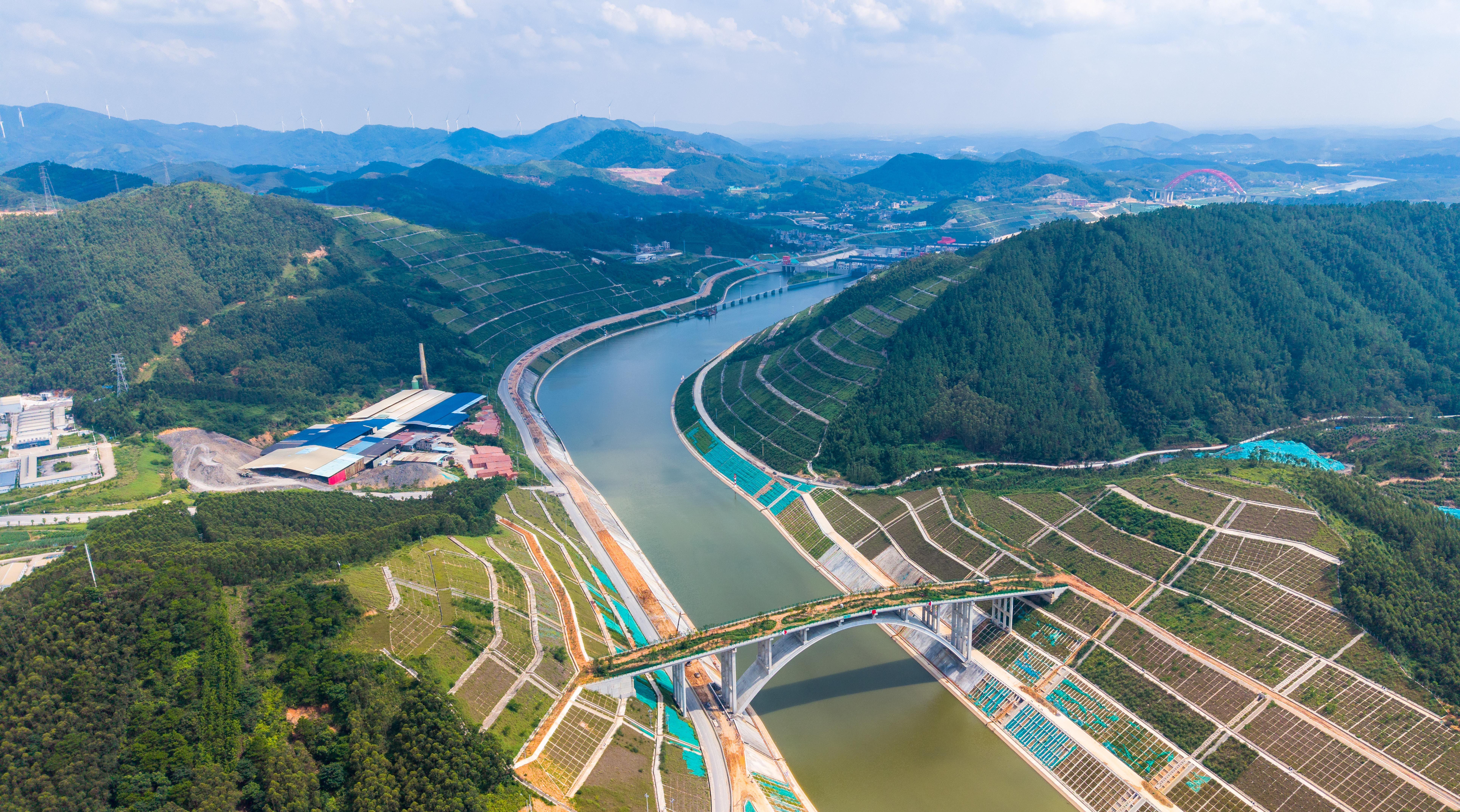 QINZHOU, CHINA - AUGUST 15: Fruit-bearing trees favored by small animals are planted on the Pinglu Canal ecological corridor bridge on August 15, 2026 in Qinzhou, Guangxi Zhuang Autonomous Region of China. The 240-meter-long bridge is China's first exclusive wildlife crossing over a canal, designed to facilitate the safe migration of species including spotted linsangs, leopard cats and red-bellied squirrels while accommodating 5,000-ton vessel traffic. (Photo by Yan Jinchang/VCG via Getty Images)