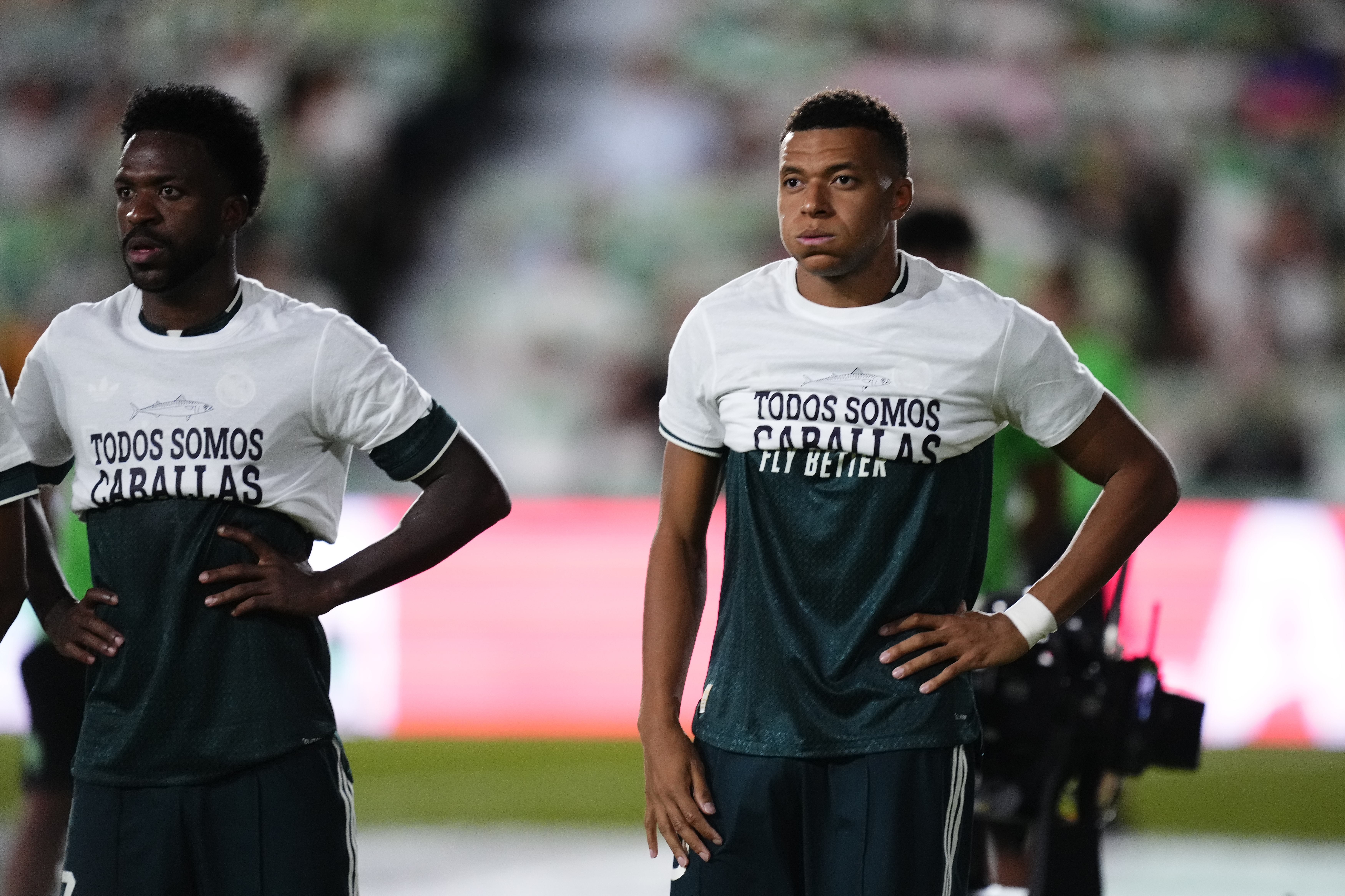 Vinicius Junior and Kylian Mbappe wearing T-shirts with rolled-up sleeves in support of Ceuta during the LaLiga EA Sports 2026/27 match between Elche CF and Real Madrid at Estadio Manuel Martinez Valero on September 15, 2026 in Elche, Spain. (Photo by Jose Breton/Pics Action/NurPhoto via Getty Images)