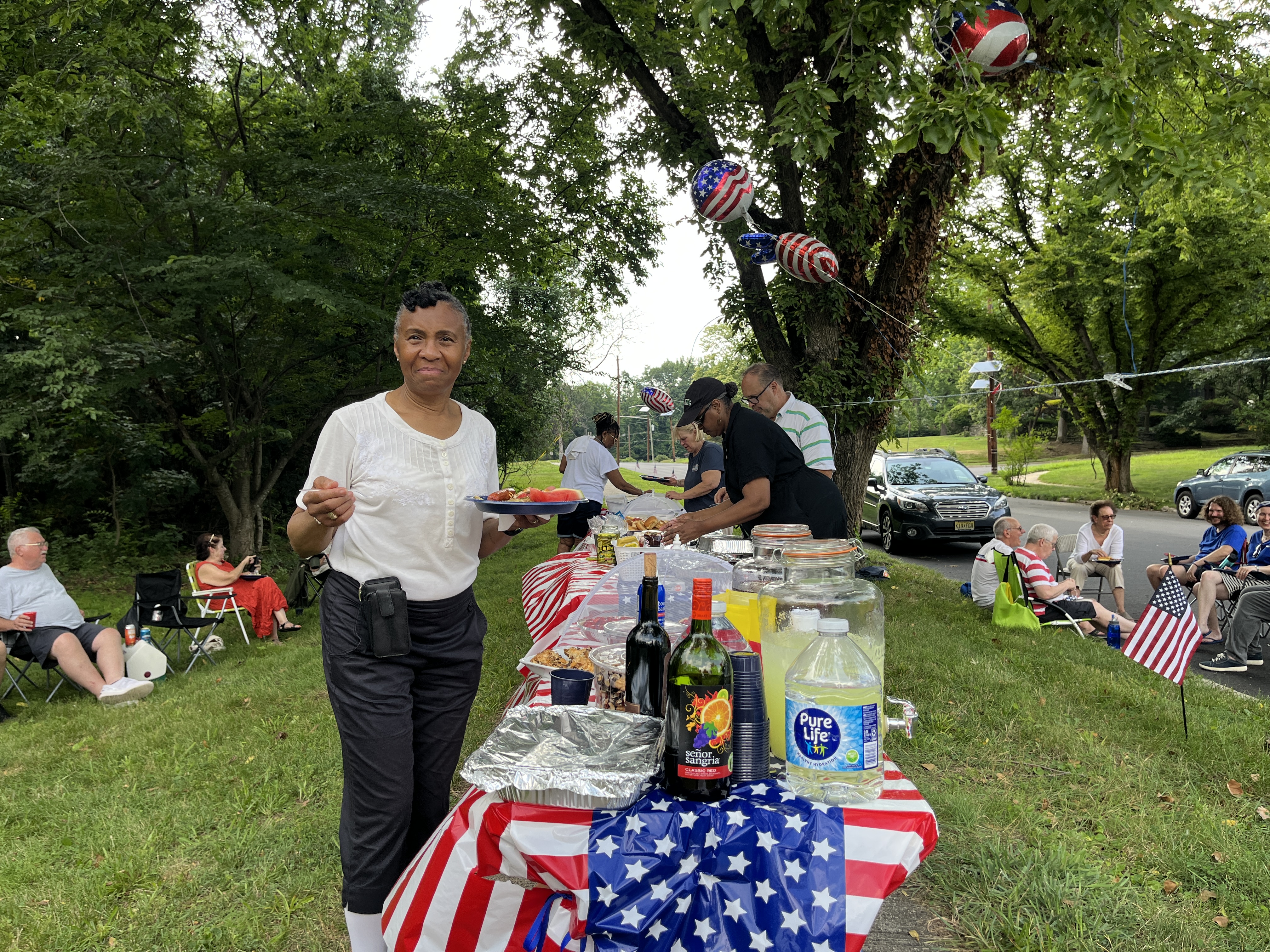 Hiltonia residents enjoy a community gathering as part of America's Potluck [Juhie Bhatia/Al Jazeera]