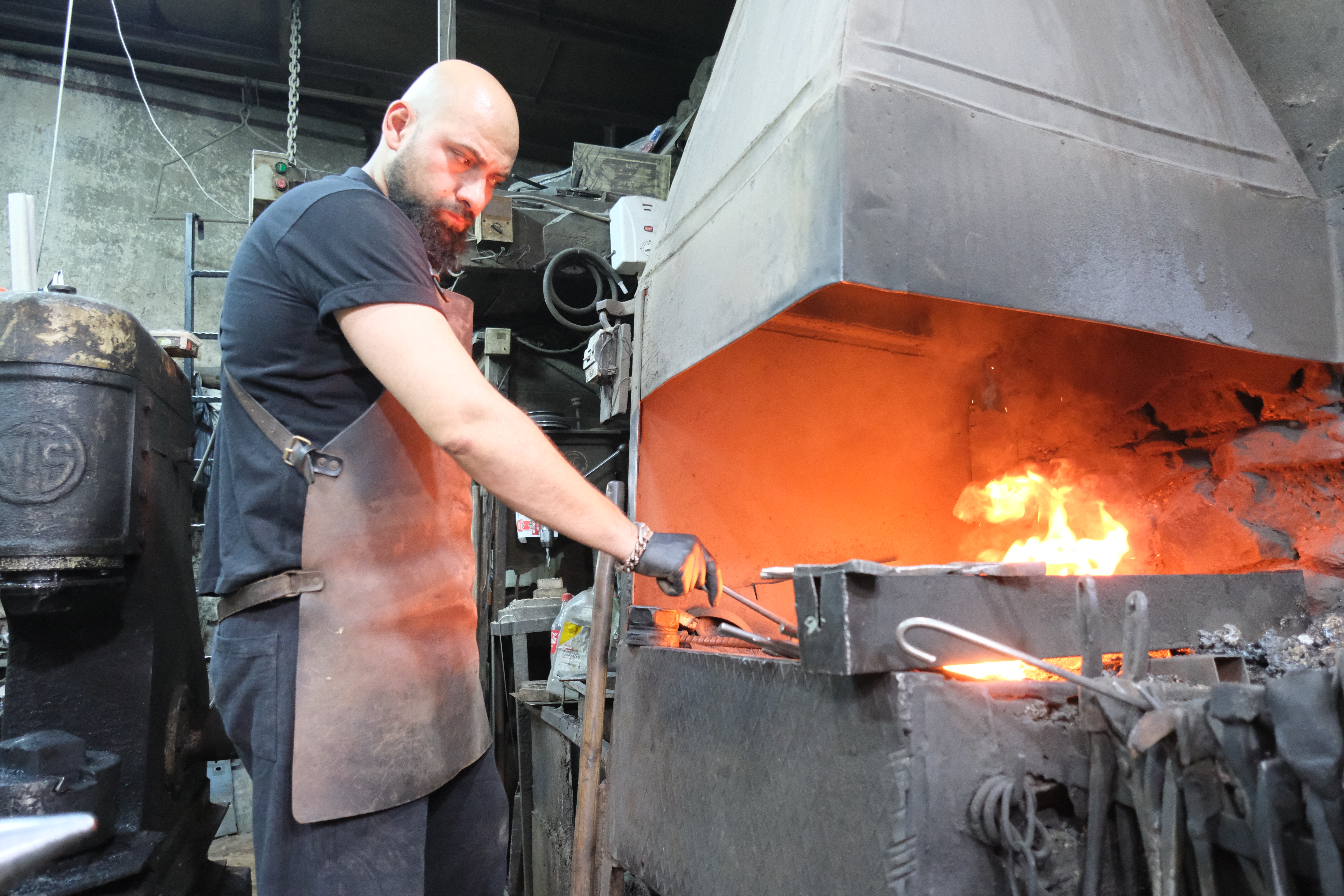 Suleyman Akdemir at the forge where, for nine years, he worked into the night, after the family’s traditional orders had been completed for the day