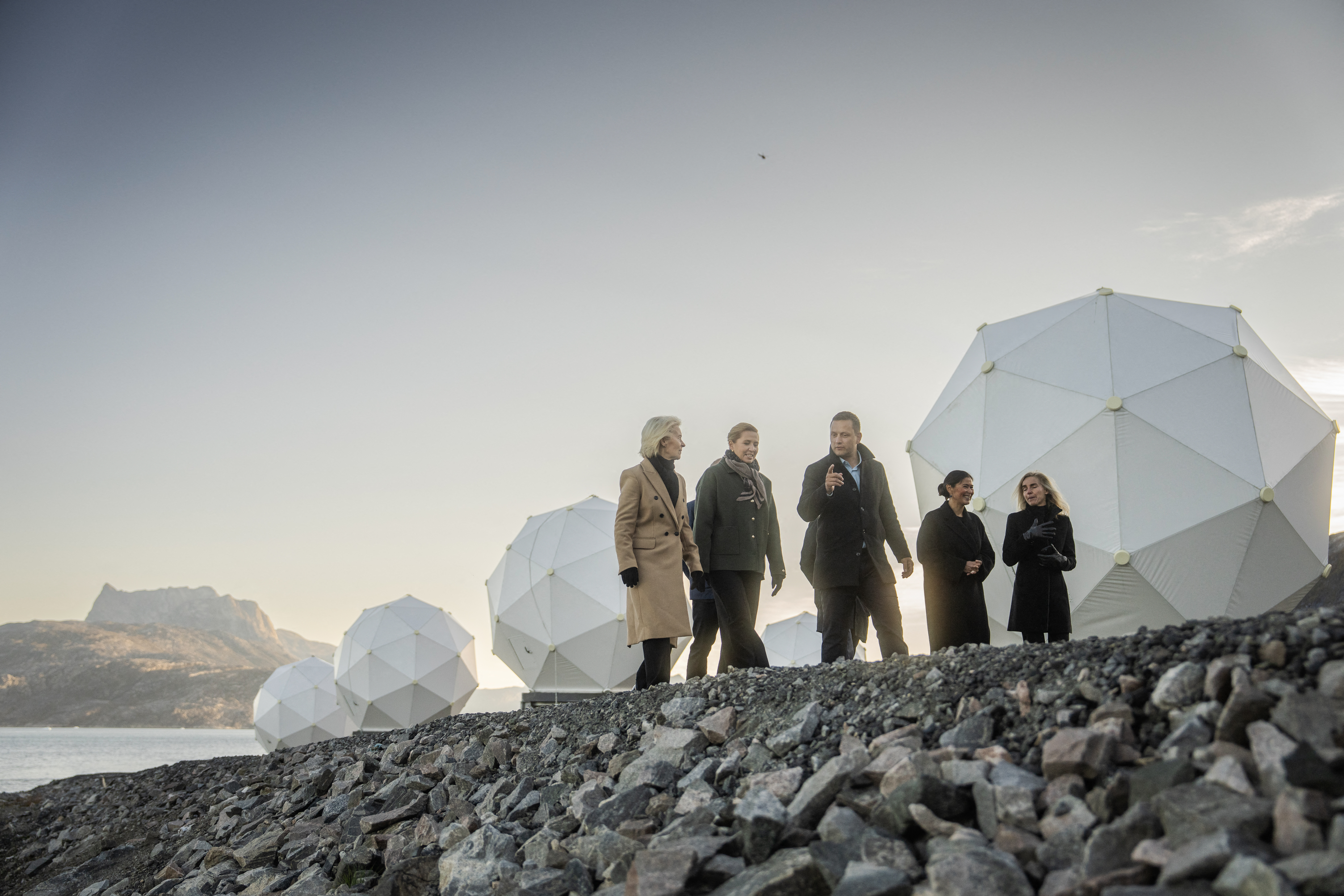 The President of the European Commission Ursula von der Leyen (L), Greenland's head of government Jens-Frederik Nielsen (C) and Danish Prime Minister Mette Frederiksen (2ndL) visit the company Eutelsat Oneweb in Nuuk, Greenland, on September 7, 2026. (Photo by Mads Claus Rasmussen / Ritzau Scanpix / AFP) / DENMARK OUT