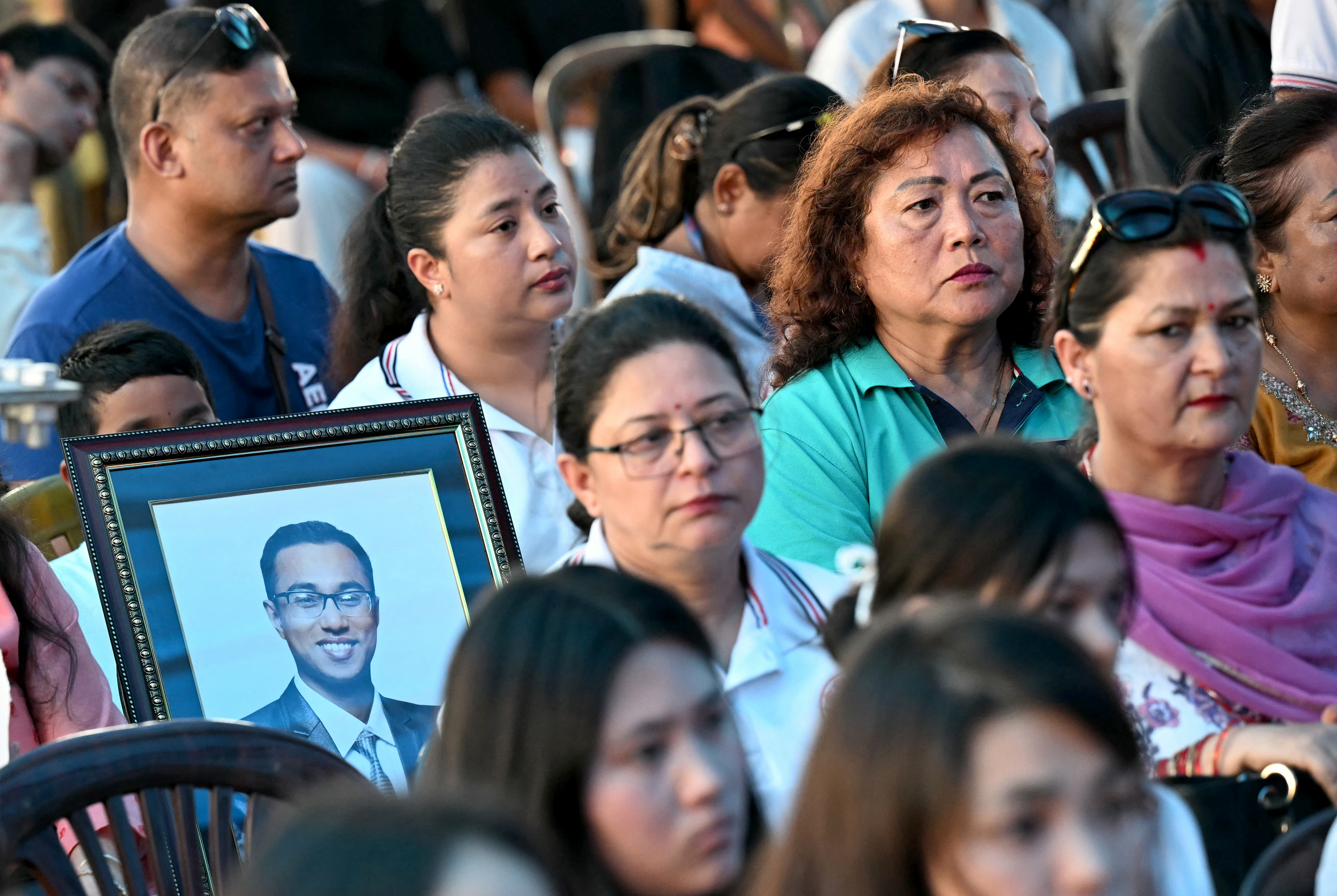 People gather to pay homage to victims of the 2025 anti-corruption Gen-Z protests, during a memorial at the old Parliament building in Kathmandu on September 8, 2026, marking the first anniversary of the demonstrations that toppled the previous government.