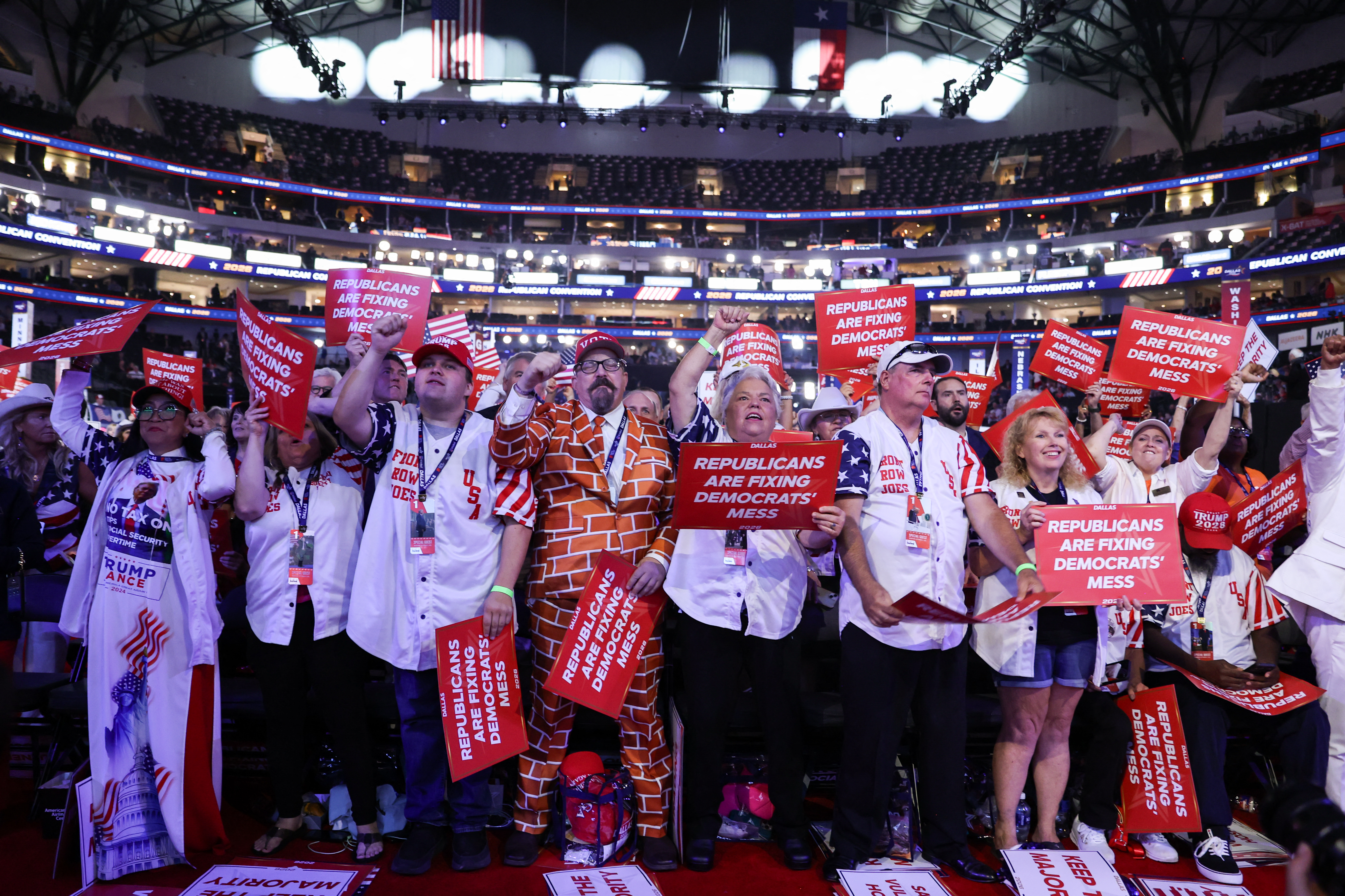 Attendees, calling themselves the "Front Row Joes," cheer during the first day of the Republican National Midterm Convention at the American Airlines Center in Dallas, Texas on September 9, 2026.