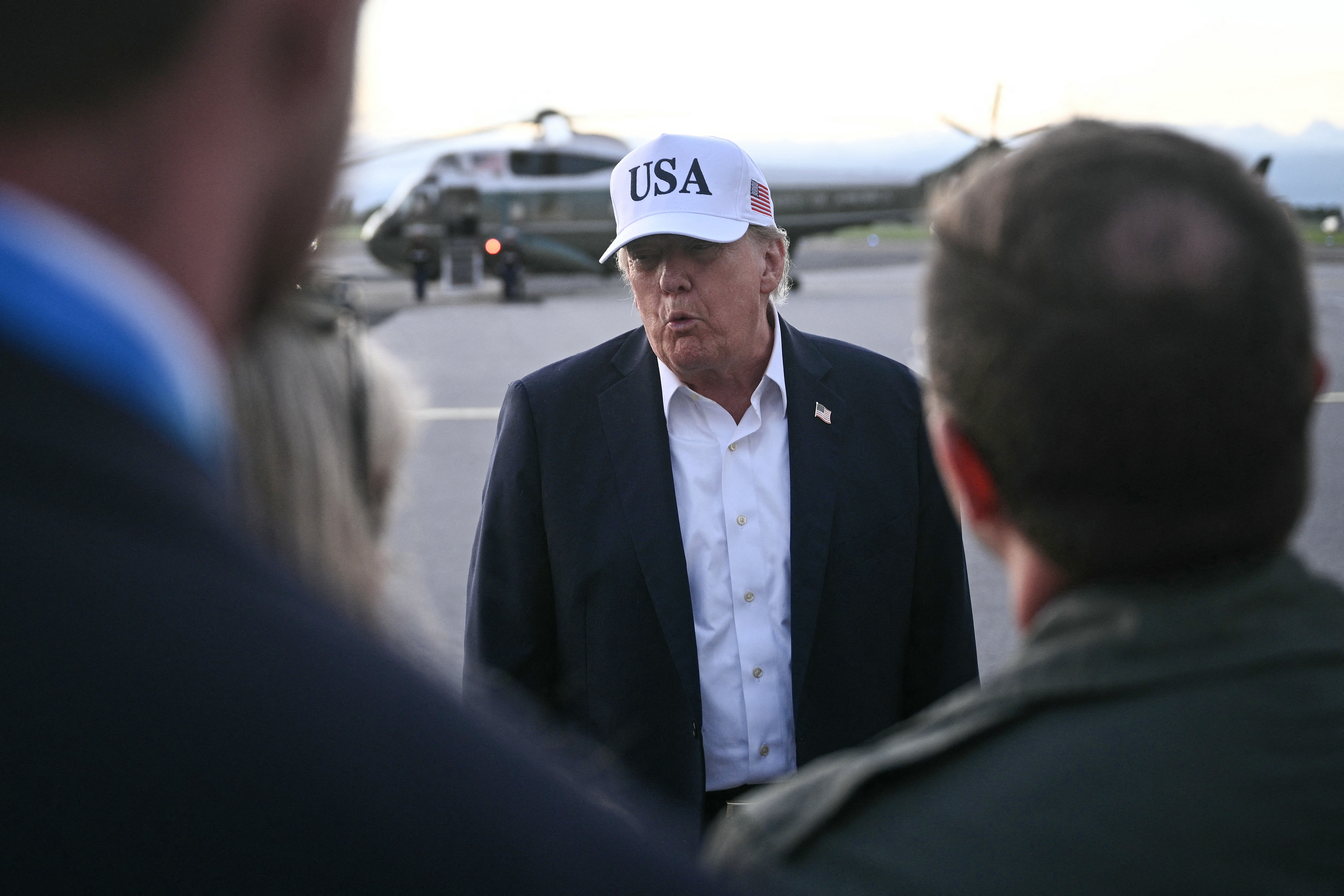 US President Donald Trump speaks to members of the media before boarding Air Force One to leave from Shannon Airport, western Ireland on September 13, 2026, after attending the final day of the Irish Open golf tournament in nearby Doonbeg.