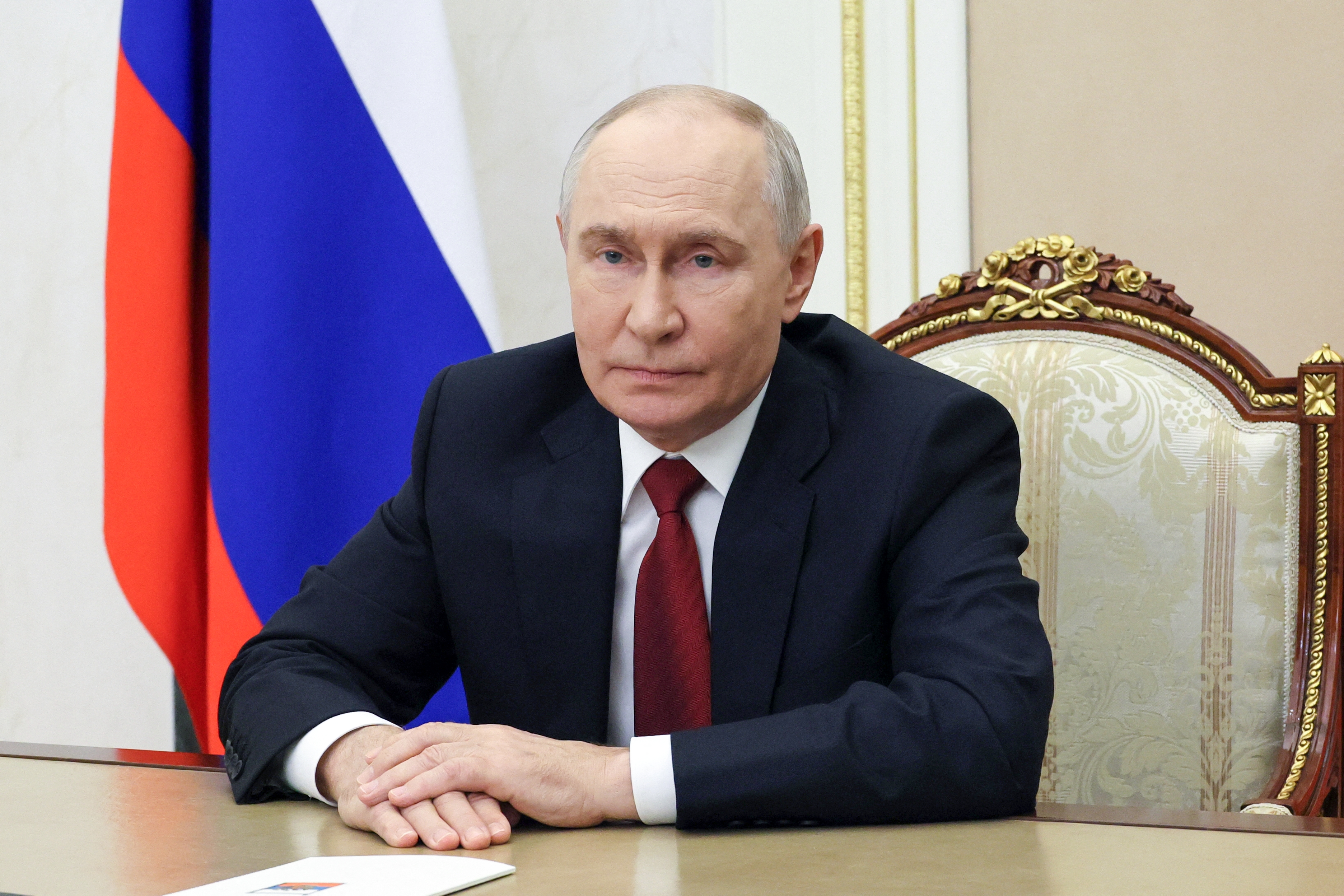 In this pool photograph distributed by the Russian state agency Sputnik on September 16, 2026, Russia's President Vladimir Putin delivers a televised address to the nation ahead of the parliamentary election, in Moscow.