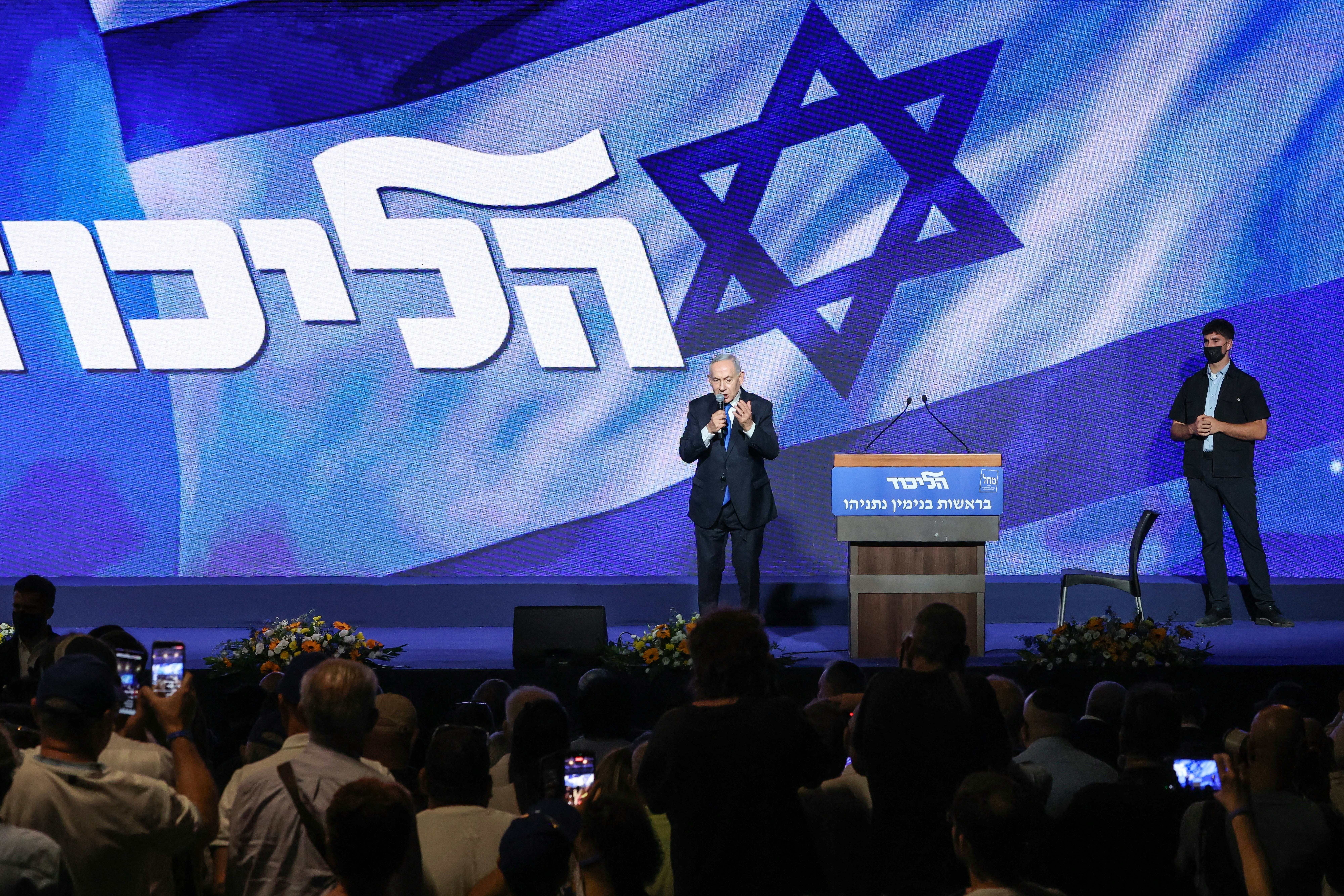 Israeli Prime Minister Benjamin Netanyahu delivers a speech during a Jewish New Year greetings event attended by members of the Likud party in Tel Aviv on September 17, 2026.