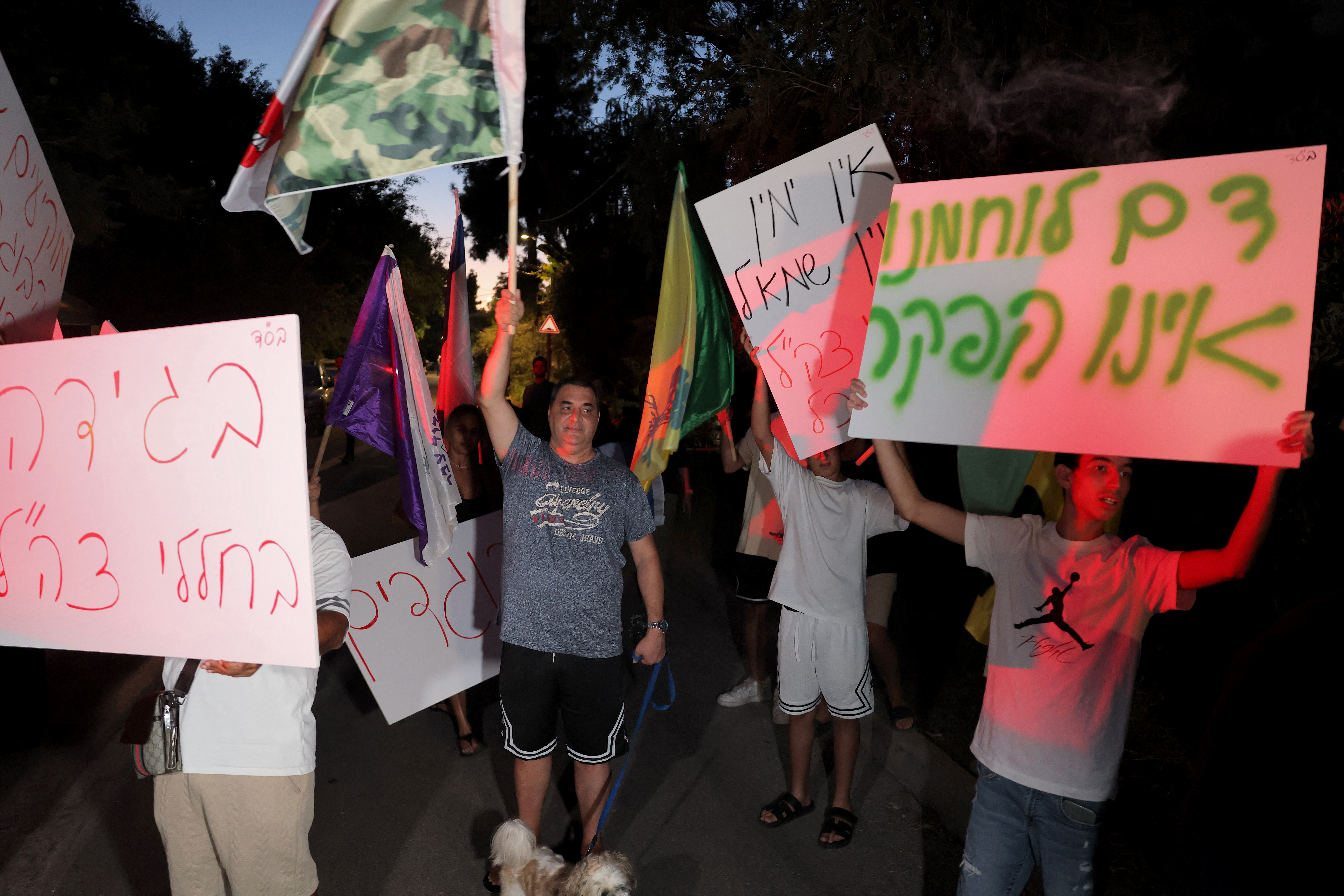 Right-wing activists protesting the 2026 documentary film "NAZA" demonstrate outside the home of the family of its co-director Rachel Szor in Israel's central city of Savyon near Tel Aviv on September 16, 2026.