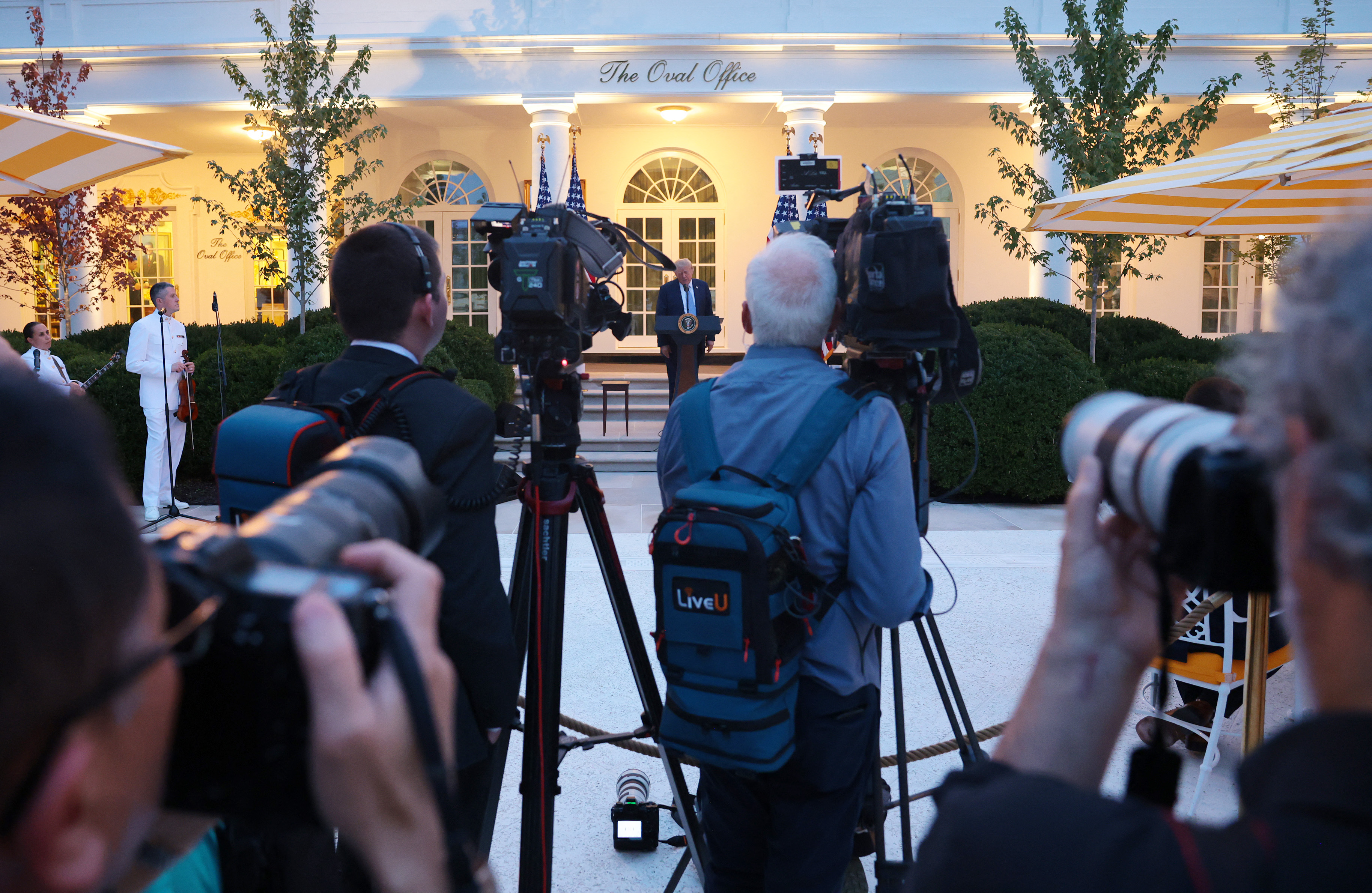 WASHINGTON, DC - SEPTEMBER 17: U.S. President Donald Trump speaks at a dinner in the Rose Garden of the White House as members of the media work on September 17, 2026 in Washington, DC. Trump was hosting the dinner for hunters, anglers and outdoor industry leaders after signing executive orders expanding hunting and fishing on public lands and reversing certain restrictions enacted in the Biden administration. Anna Moneymaker/Getty Images/AFP (Photo by Anna Moneymaker / GETTY IMAGES NORTH AMERICA / Getty Images via AFP)