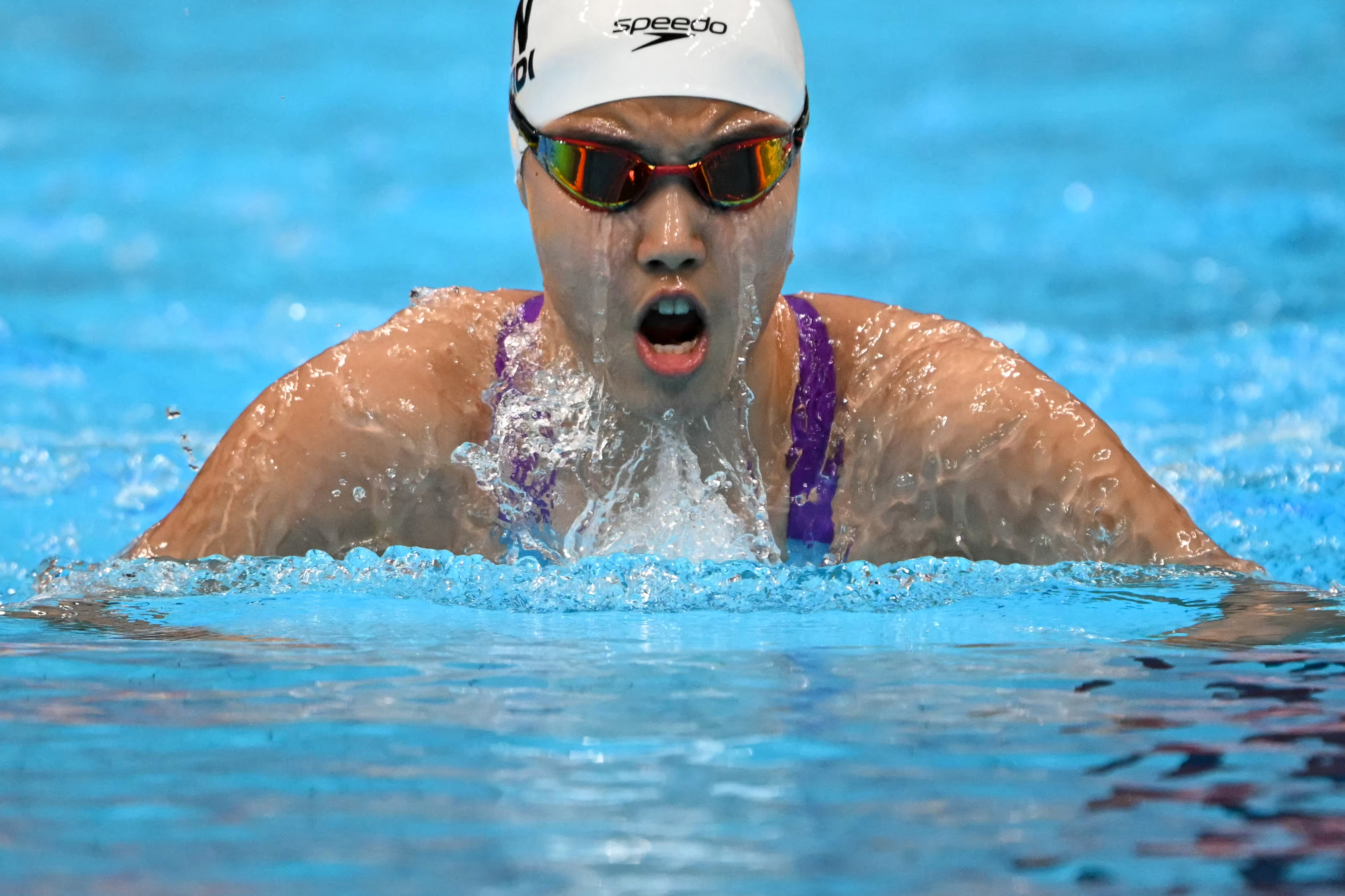 China's Yu Zidi competes in the final of the women's 400m individual medley swimming event during the 2026 Asian Games at the Tokyo Aquatics Centre in Tokyo on September 23, 2026.