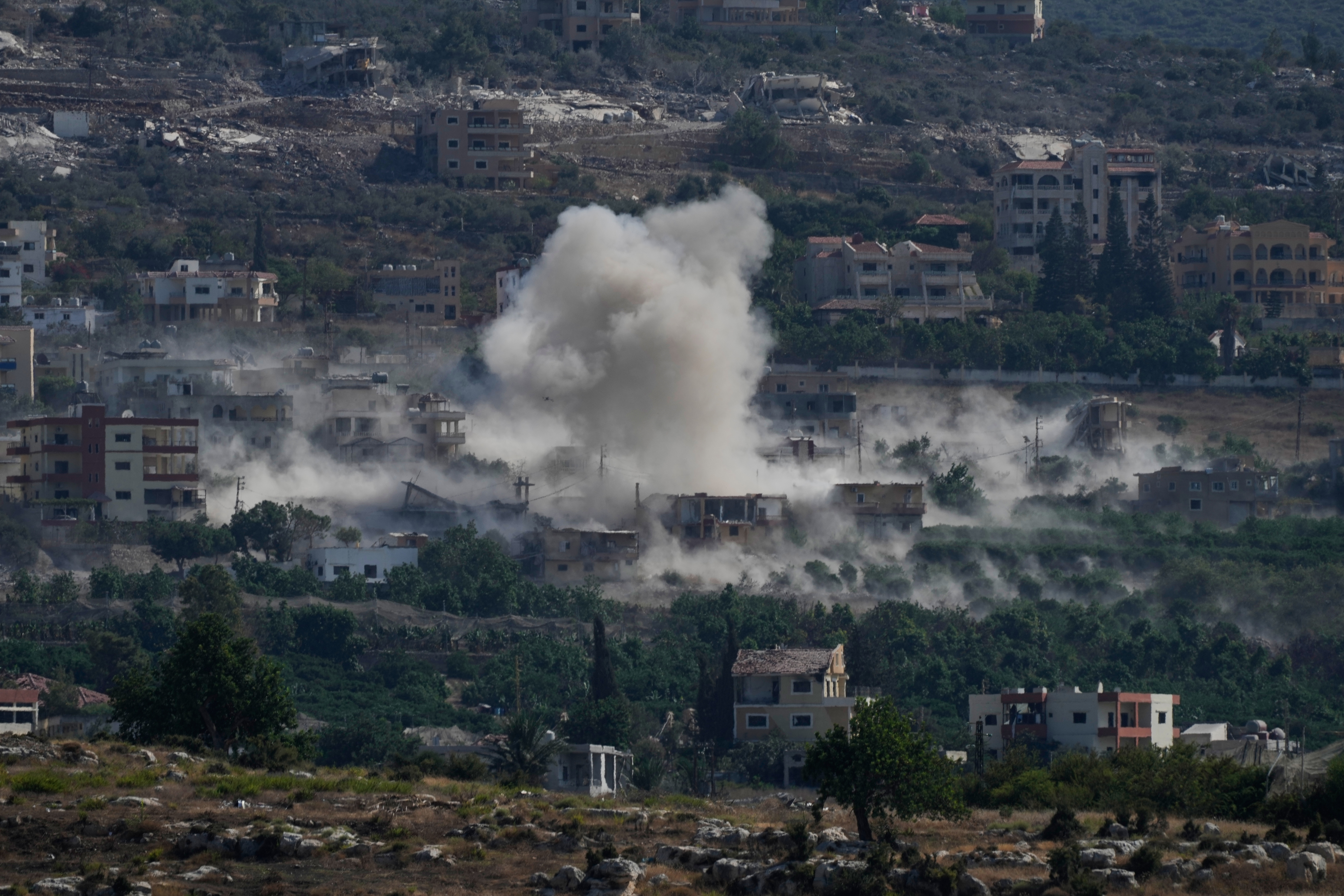 Smoke rises as Israeli forces demolish homes in Mansouri village, southern Lebanon, Thursday, Sept. 3, 2026. (AP Photo/Mohammed Zaatari)