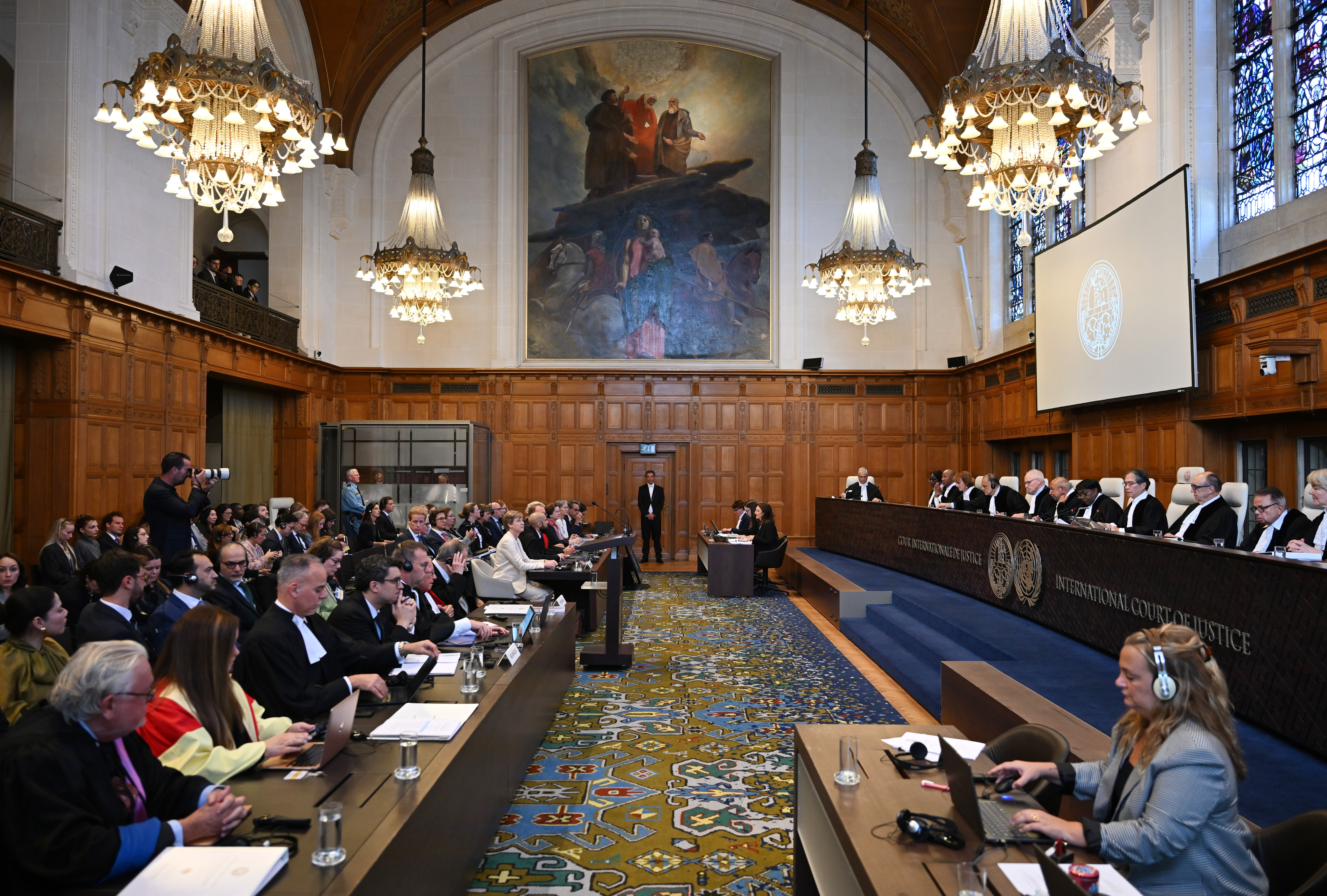 Judges of the International Court of Justice (ICJ) are pictured on the bench during the public hearings at the Peace Palace in The Hague, Netherlands, Monday, Sept. 7, 2026. (AP Photo/Mouneb Taim)
