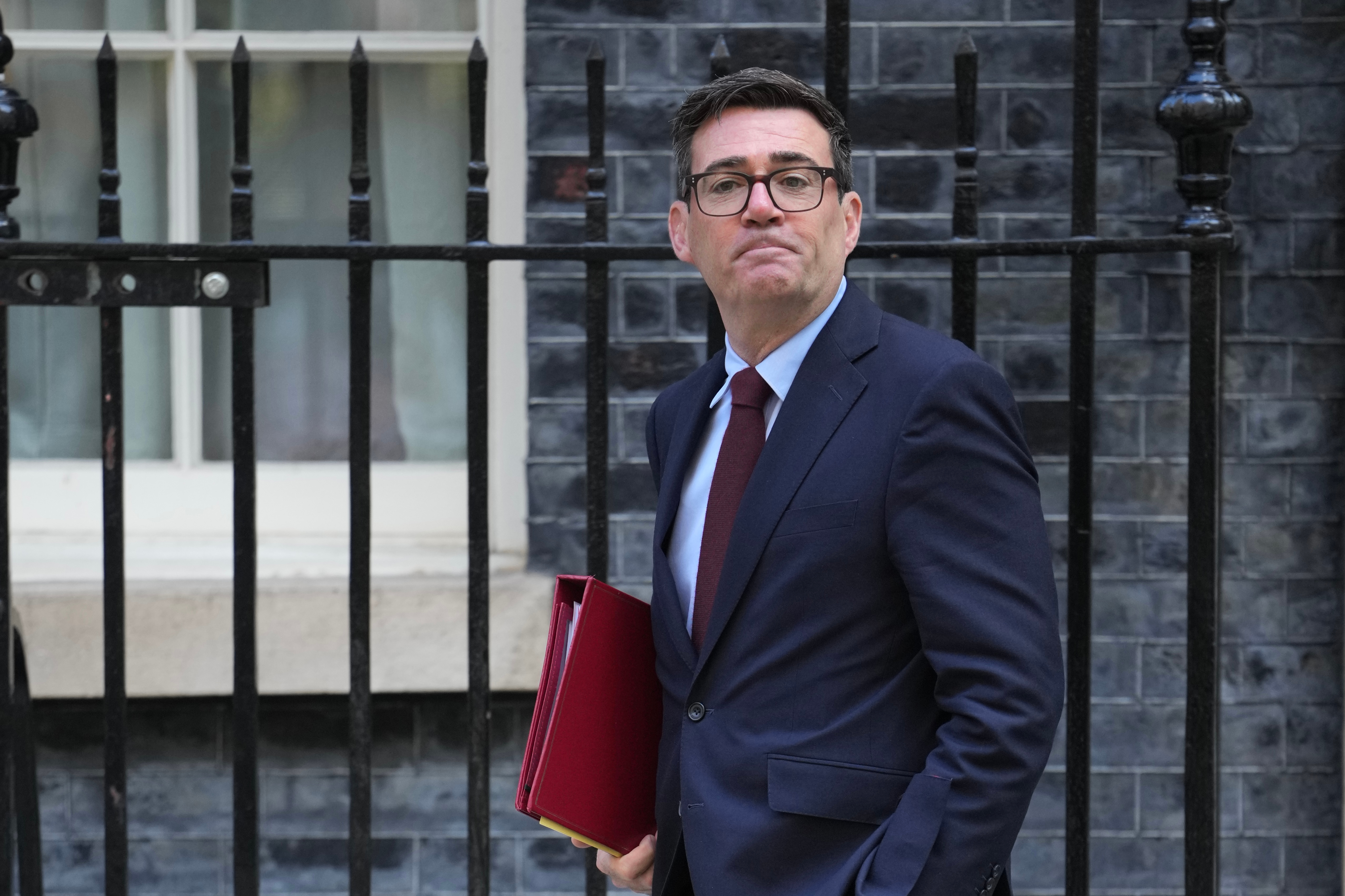 Britain's Prime Minister Andy Burnham leaves 10 Downing Street to attend the weekly Prime Ministers' Questions session in Parliament in London, Wednesday, Sept. 9, 2026. (AP Photo/Kin Cheung)