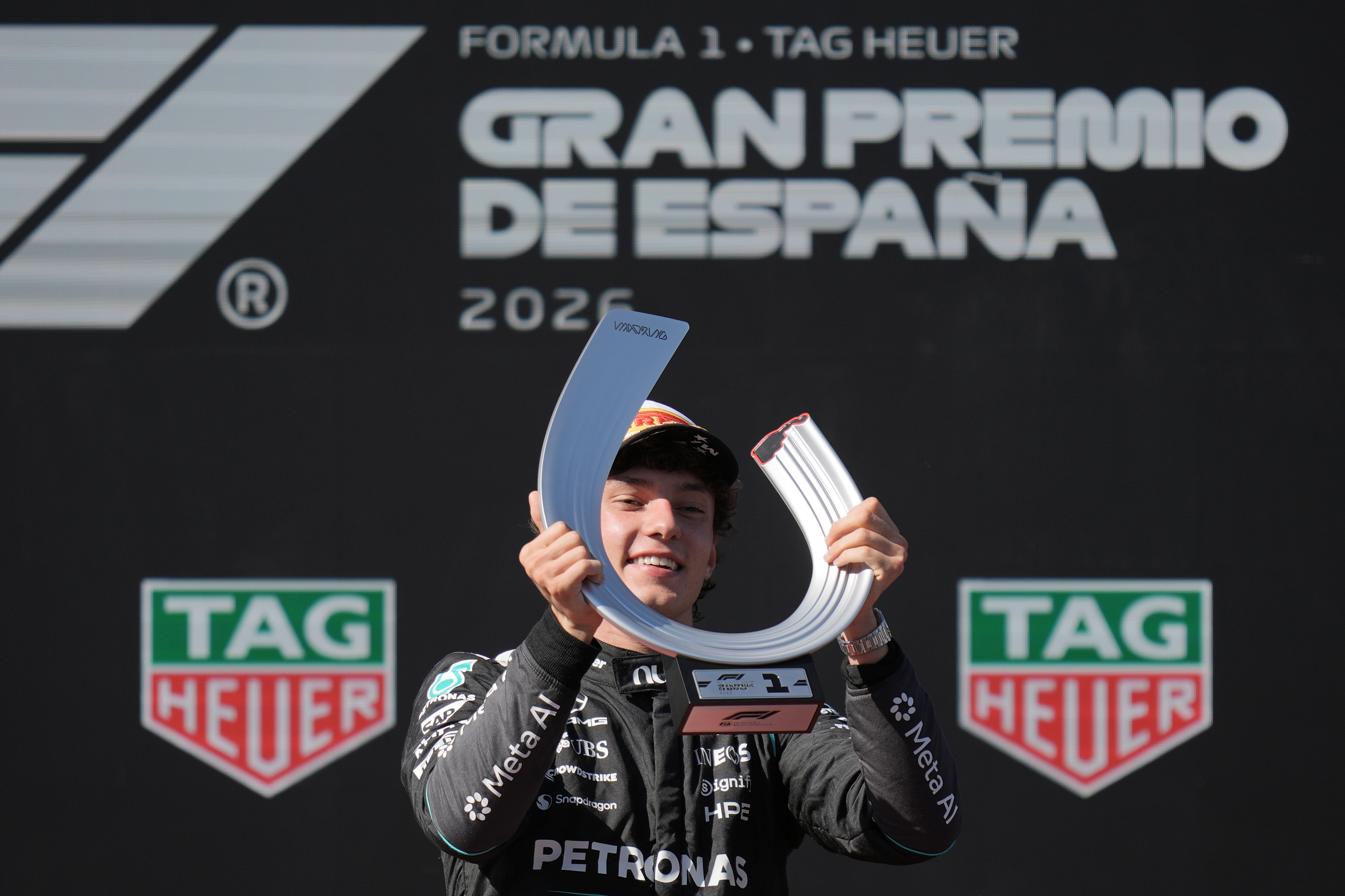 Mercedes driver Andrea Kimi Antonelli of Italy celebrates on the podium after winning the Spanish Formula One Grand Prix race in Madrid, Sunday, Sept. 13, 2026. (AP Photo/Bernat Armangue)
