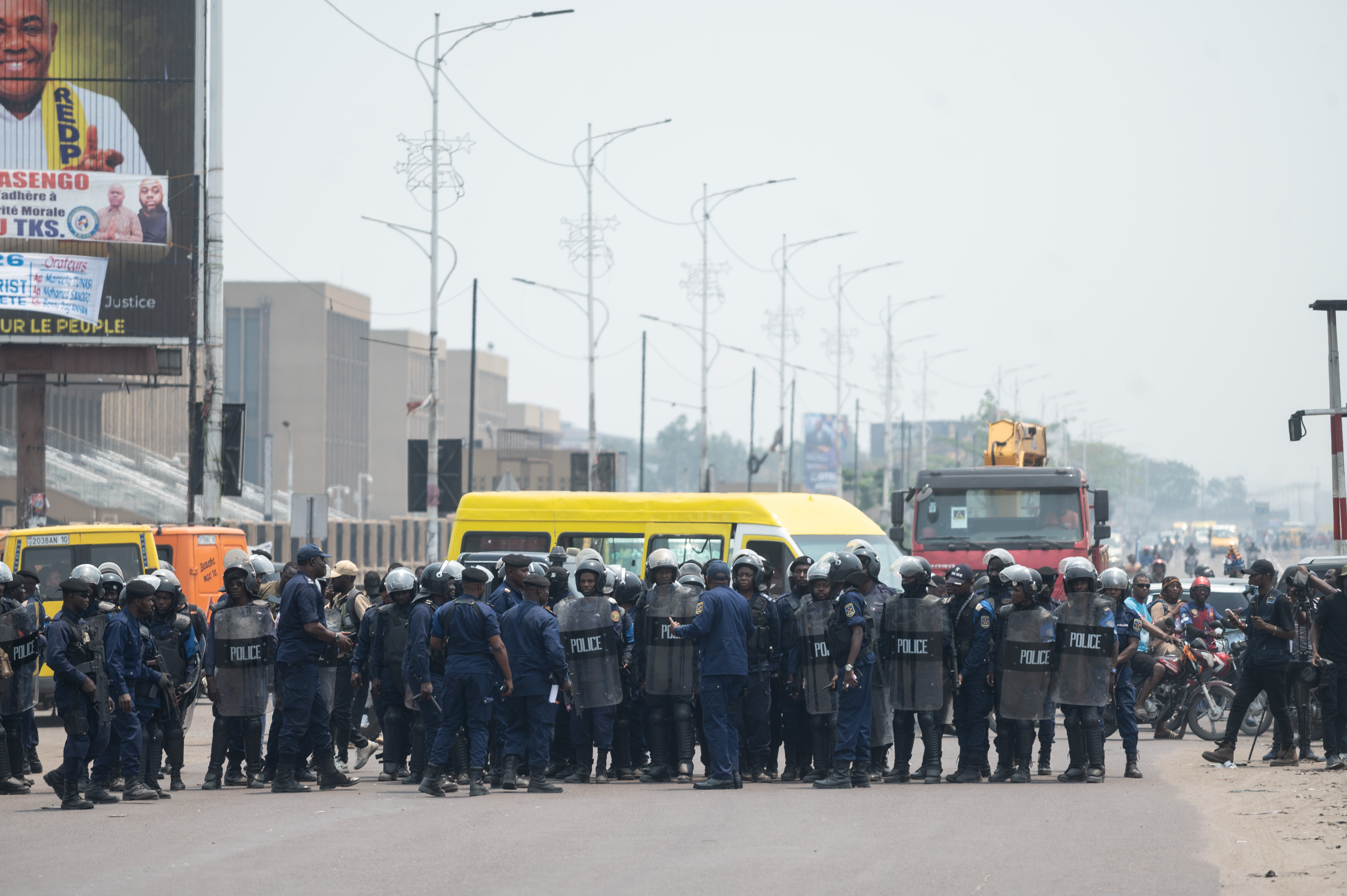 Security forces take position ahead of a protest organized by opposition parties against constitutional changes proposed by President Felix Tshisekedi, in Kinshasa, Congo, Tuesday, Sept. 15, 2026. (AP Photo/Samy Ntumba Shambuyi)