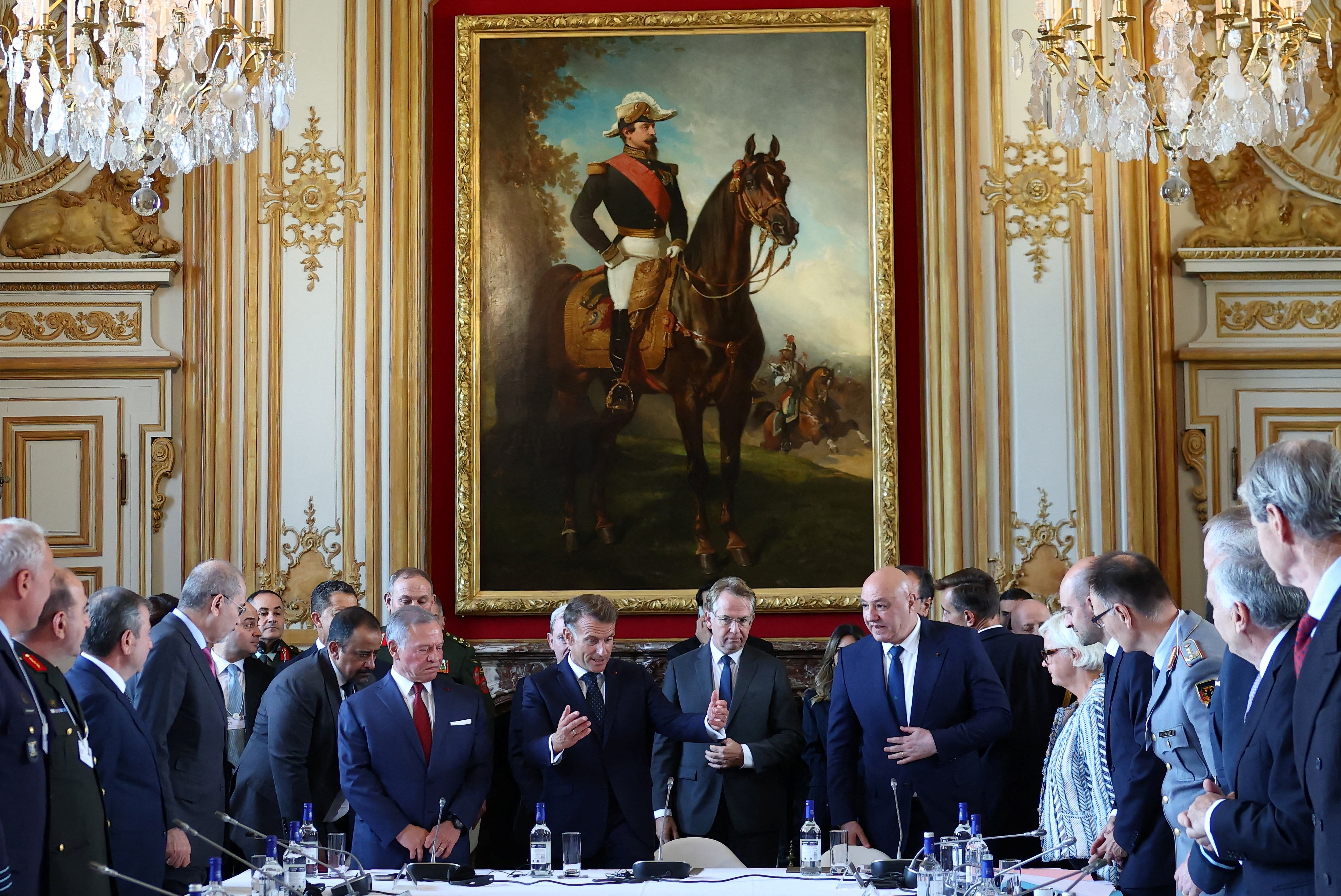 French President Emmanuel Macron, centre, Jordan's King Abdullah II, centre left, and Lebanese President Joseph Aoun, center right, open the "Aqaba Process" meeting in support of the Lebanese Armed Forces (LAF) at the Hotel des Invalides in Paris, Thursday, Sept. 17, 2026. (Gonzalo Fuentes/Pool Photo via AP)