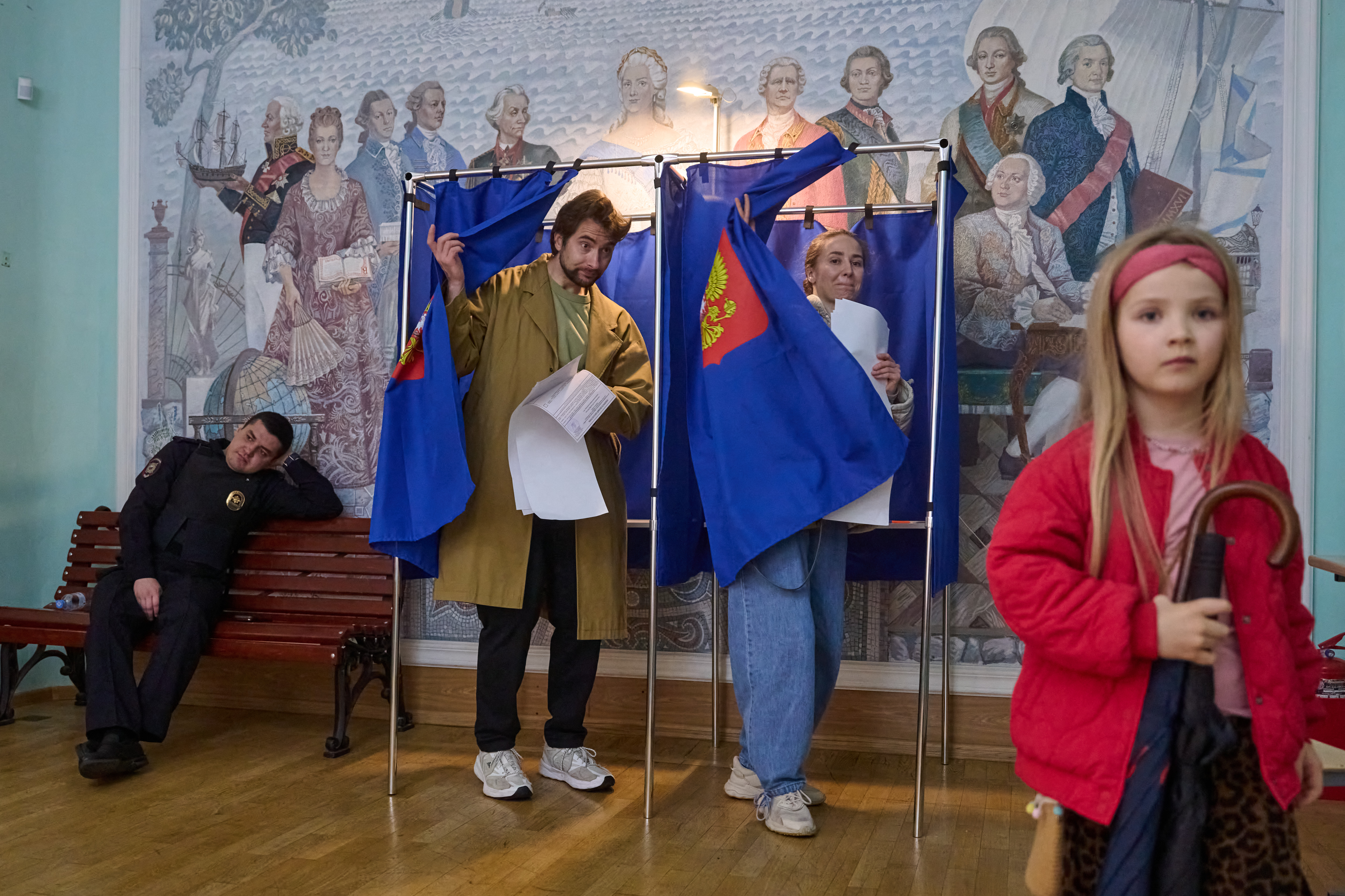 Voters leave polling booths during the in St Petersburg, Russia