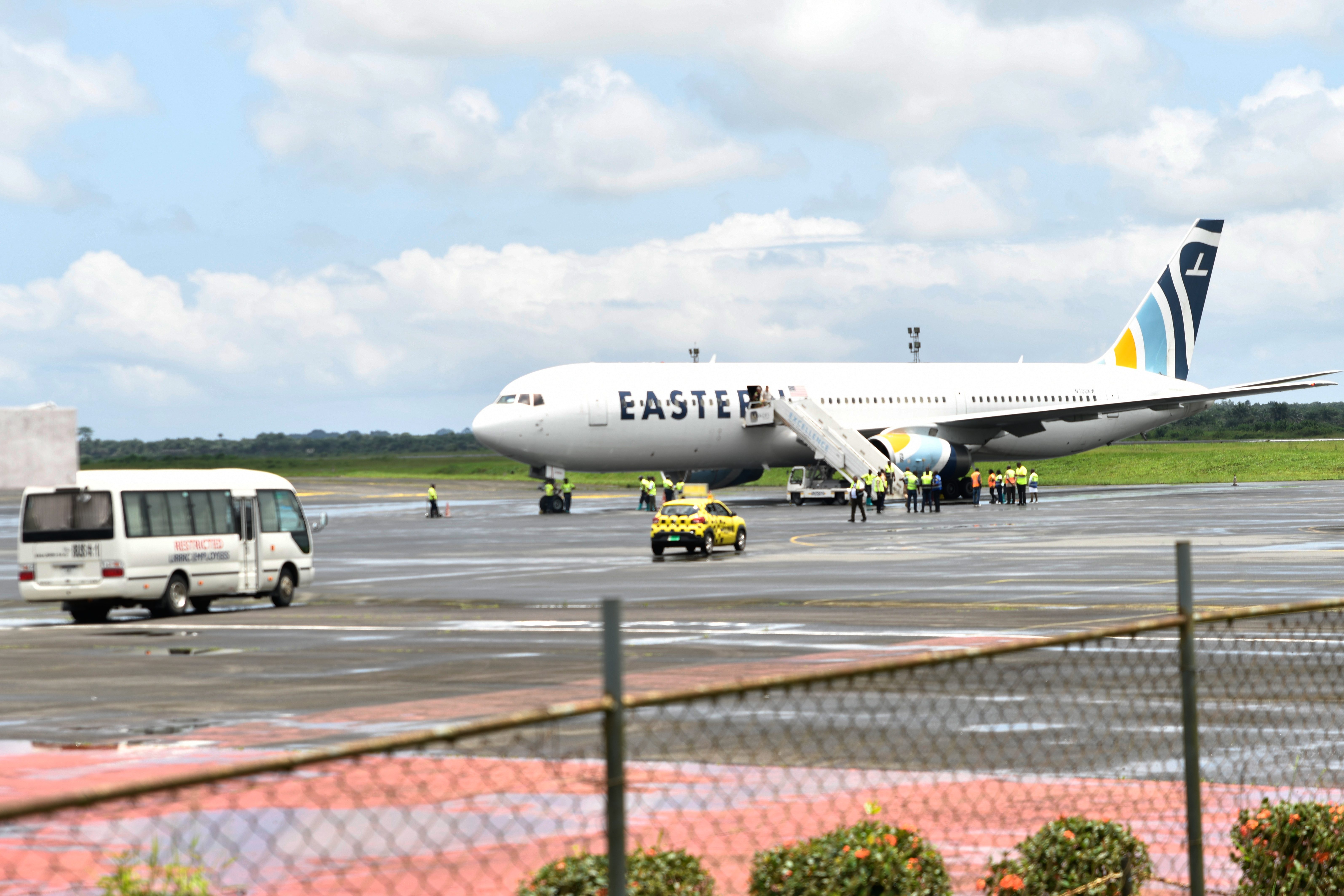 Plane carrying the deportees from the US arrives at the Roberts International Airport outside of Monrovia, Liberia, Thursday, Aug. 20, 2026. (AP Photo/Alexander Wiaplah)