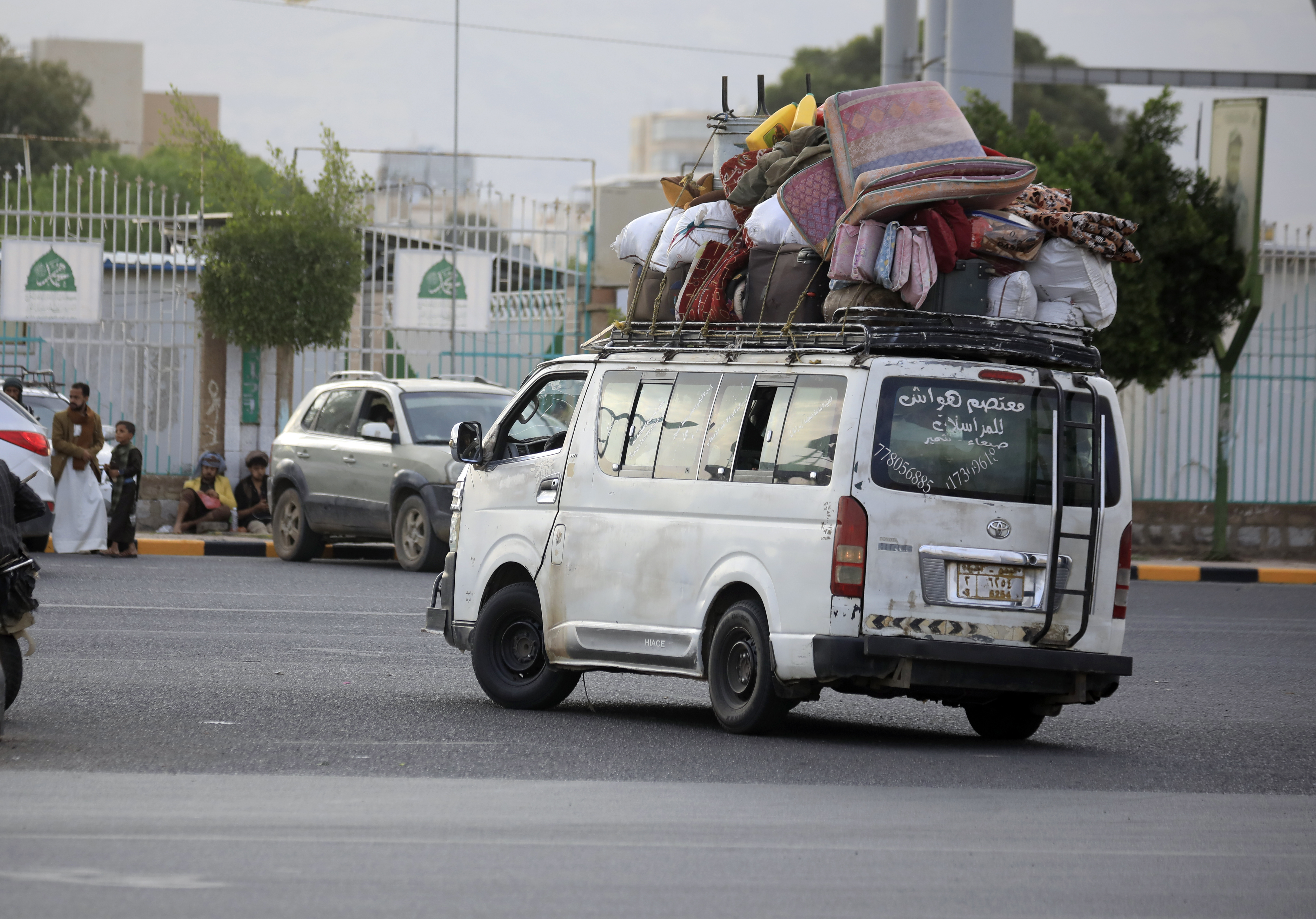epa13215552 People ride a bus loaded with belongings along a street in Sana'a, Yemen, 05 September 2026. Yemen is experiencing an escalation of fighting in the southwestern city of Taiz between Saudi-backed government forces and the Houthi fighters, displacing nearly 1,800 families over the past two days, according to a statement by the UN Office for the Coordination of Humanitarian Affairs (OCHA). EPA/YAHYA ARHAB