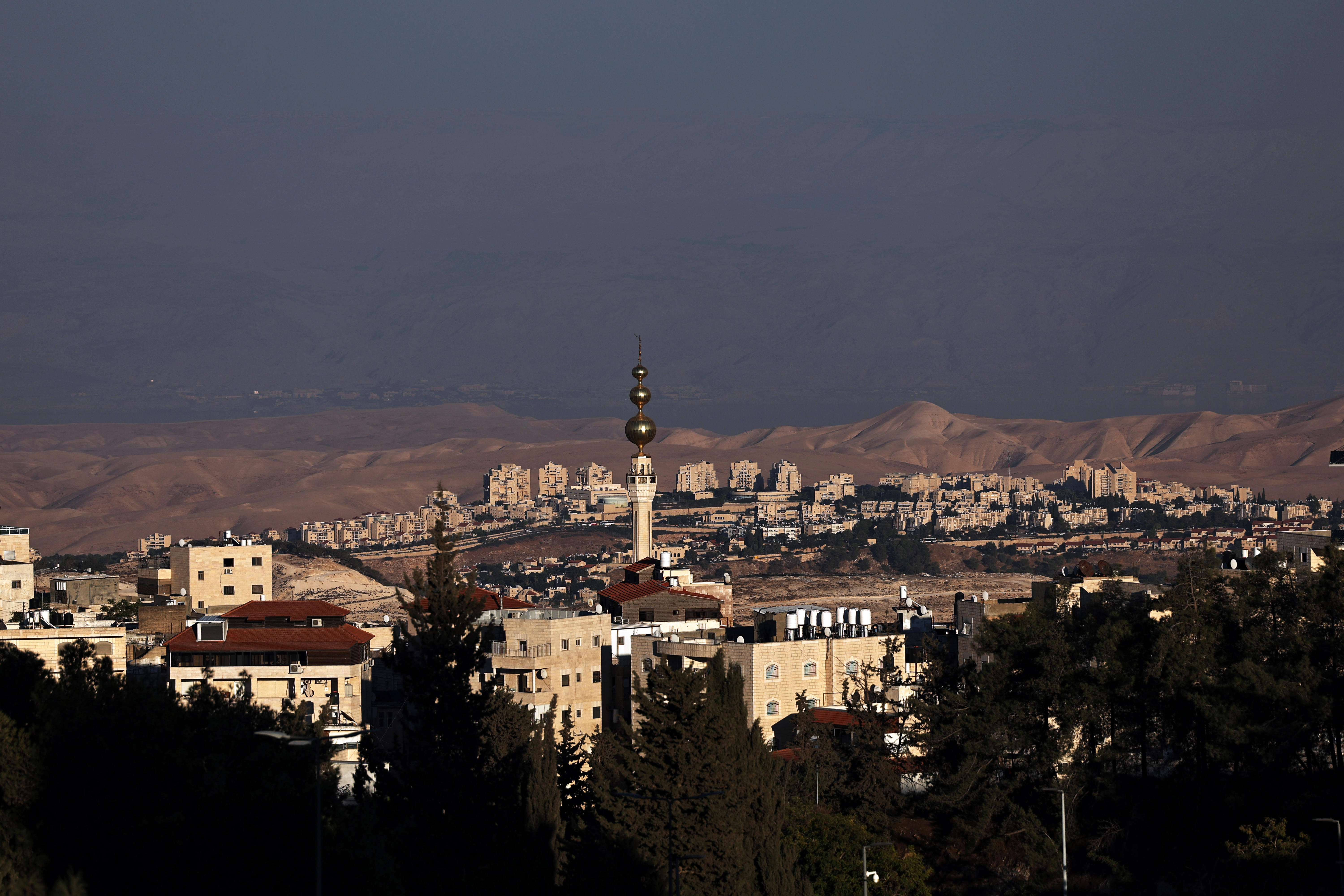 epa13225814 A view of the West Bank settlement of Maale Adumim, the East Jerusalem neighborhood of Isawiyah and the Jordan side of Dead Sea, 09 September 2026. Israeli Foreign Minister Gideon Saar announced countermeasures on 09 September, including the consulate's closure, in response to new sanctions against Israeli settlements introduced by UK Foreign Secretary Ed Miliband. Countries including Canada, France, Iceland, Ireland, Denmark, Norway, Spain, Poland, Portugal, Finland, and Sweden backed joint measures restricting imports from West Bank settlements. EPA/ATEF SAFADI