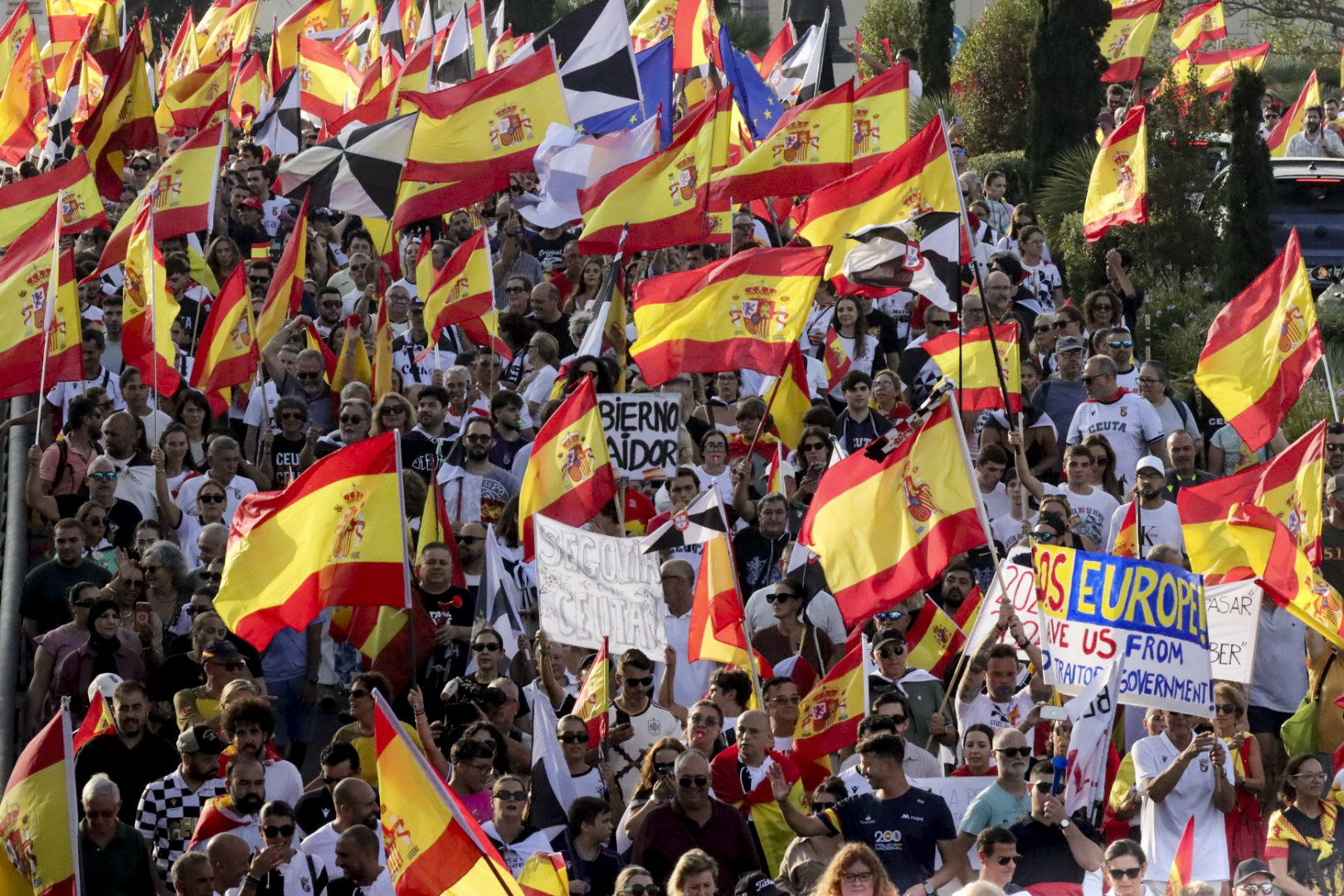 epa13207419 People attend a rally called on occasion on Ceuta Day and amid the migrant crisis in Ceuta, Spain, 02 September 2026. Rallies have been called in front of town halls across Spain as the country faces a massive migration crisis after thousands of people crossed into the North African enclave of Ceuta from Morocco in late July 2026. EPA/REDUAN