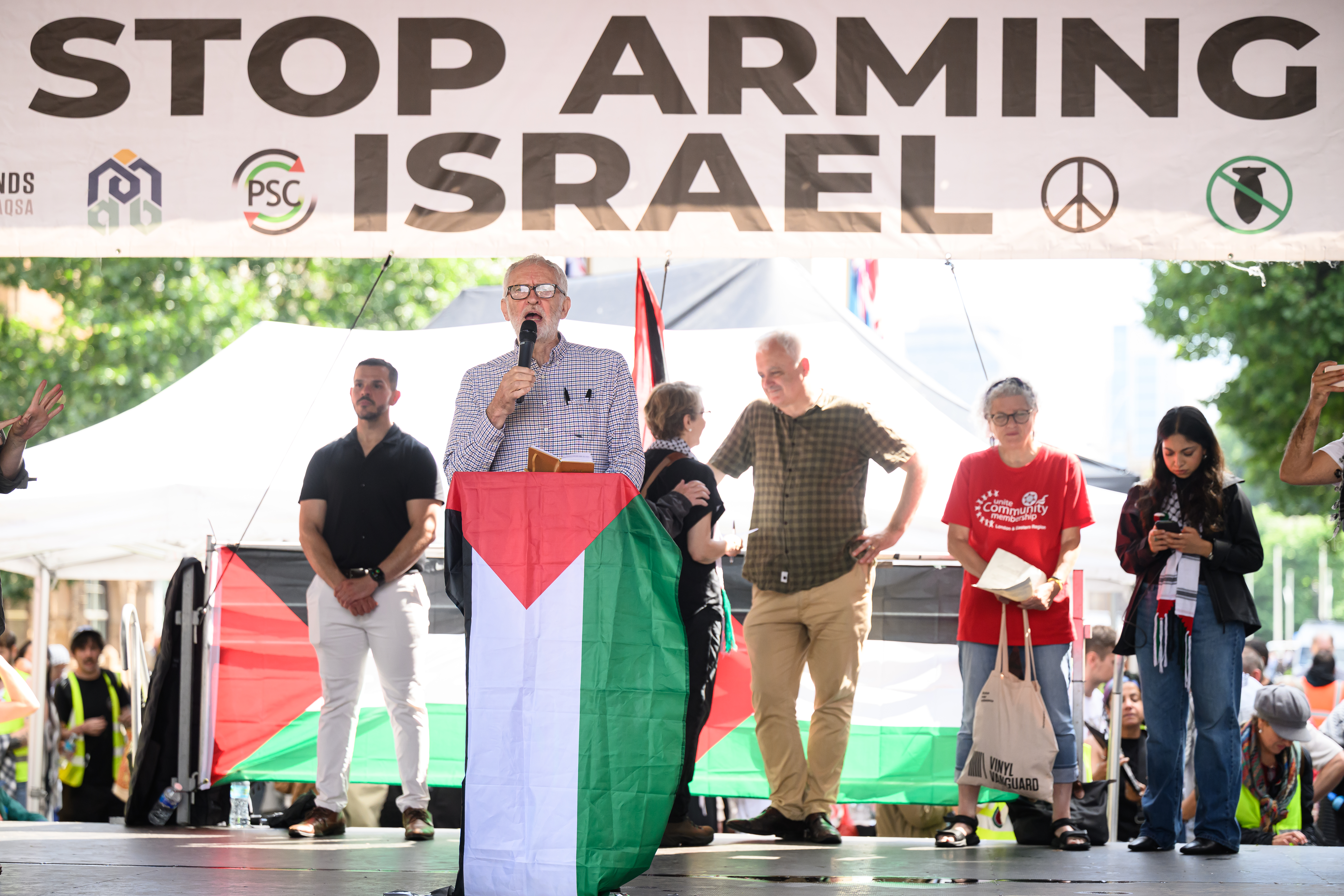 LONDON, ENGLAND - JULY 19: Former Labour Party leader Jeremy Corbyn addresses those who took part in the National March for Palestine as it reaches its conclusion in Whitehall, on July 19, 2025 in London, England. Pro-Palestinian groups have been holding rallies and marches regularly since the war began between Israel and Palestine on October 7, 2023. Organisers say this weekend is expected to be the largest one to date. (Photo by Leon Neal/Getty Images)