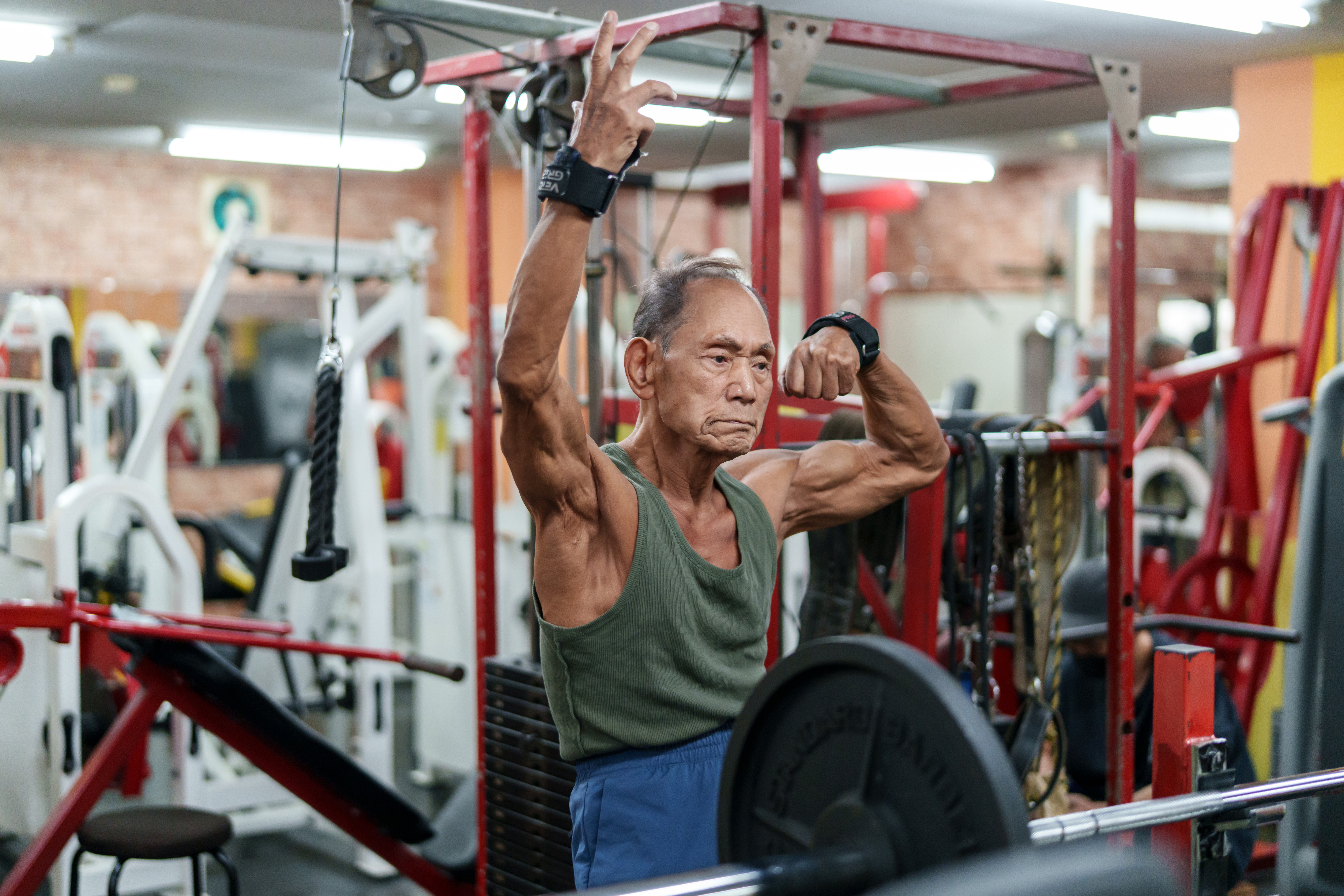 HIROSHIMA, JAPAN - SEPTEMBER 11: Toshisuke Kanazawa, a 90-year-old bodybuilder, trains in his gym in Hiroshima, Japan, on September 11, 2026. Kanazawa, Japan's oldest competitive bodybuilder and a 19-time bodybuilding champion, who turned 90 on August 29 won the All Japan Masters Fitness Championship last month. Kanazawa and his fellow competitors actively train as bodybuilders throughout their lives. Japan has the world's oldest population, with a record 29.4% of its 123 million residents aged 65 or older. (Photo by Tomohiro Ohsumi/Getty Images)