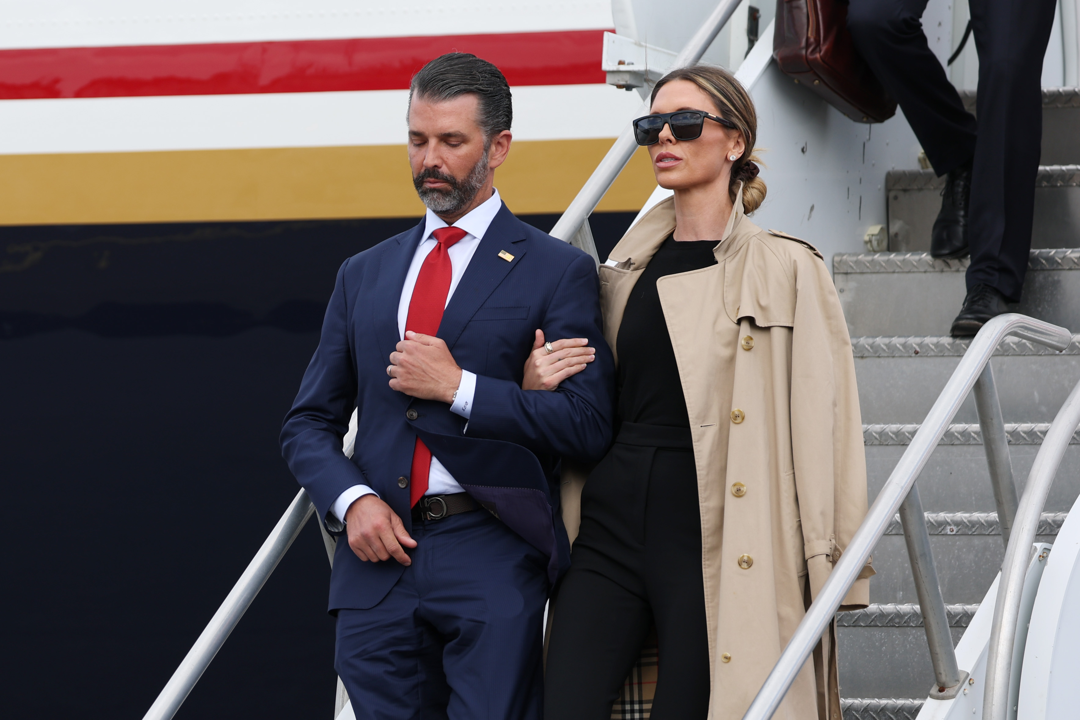 SHANNON, IRELAND - SEPTEMBER 12: Donald Trump Jr. and his wife Bettina Anderson disembark from Air Force One en route to Doonbeg at Shannon Airport on September 12, 2026 in Shannon, Ireland. U.S. President Donald Trump is on a two-day non-state visit to Ireland. Among other events today, he is holding a bilateral meeting with Taoiseach Micheál Martin at Farmleigh House in the Phoenix Park. (Photo by Anna Moneymaker/Getty Images)