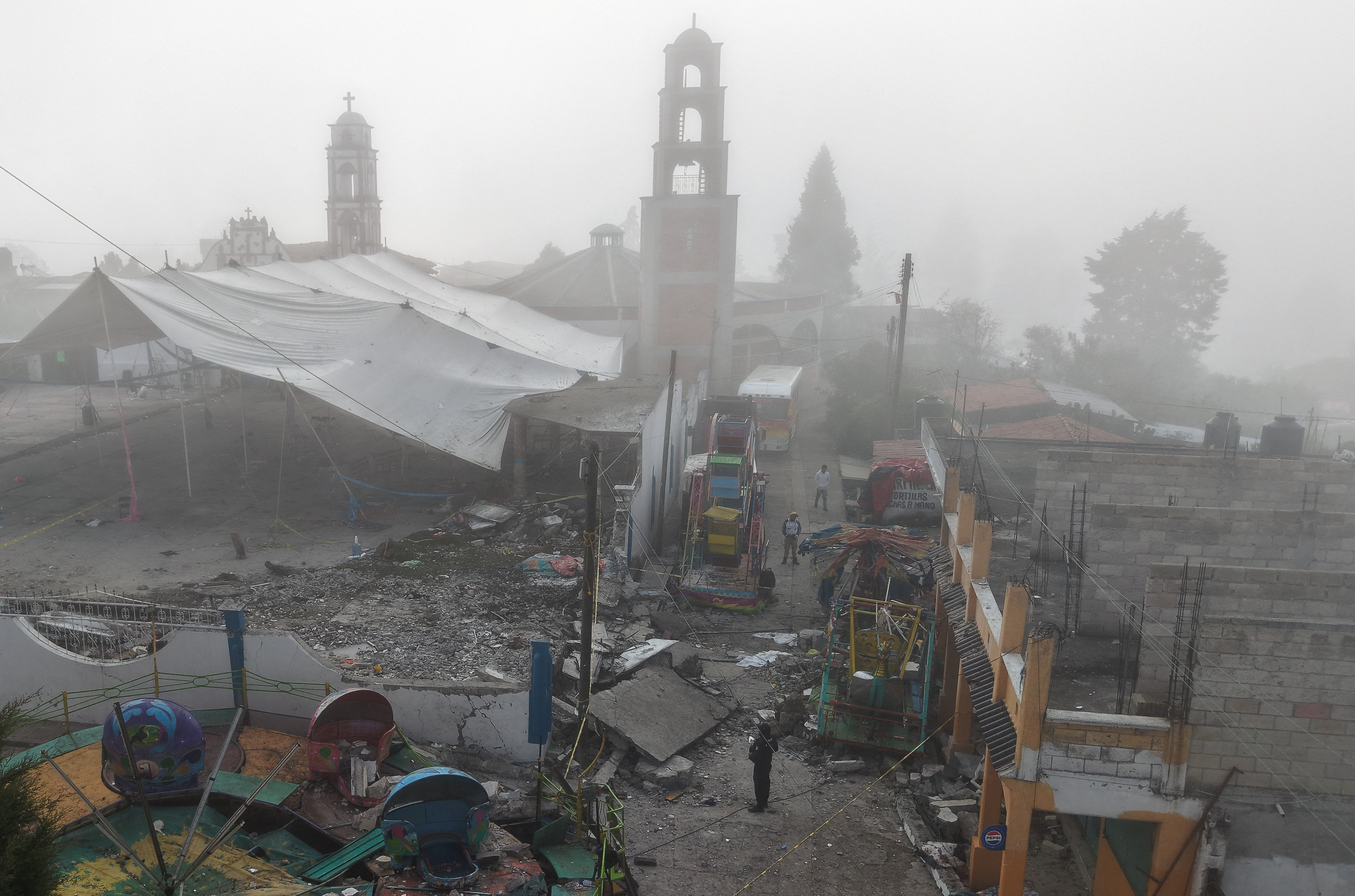 A drone view shows damage following a fireworks explosion during patron saint festivities honoring the Virgin of the Light, which left several people dead and others injured, in the community of Santa Maria Canchesda, Temascalcingo municipality, State of Mexico, Mexico, September 6, 2026. REUTERS/Luis Cortes