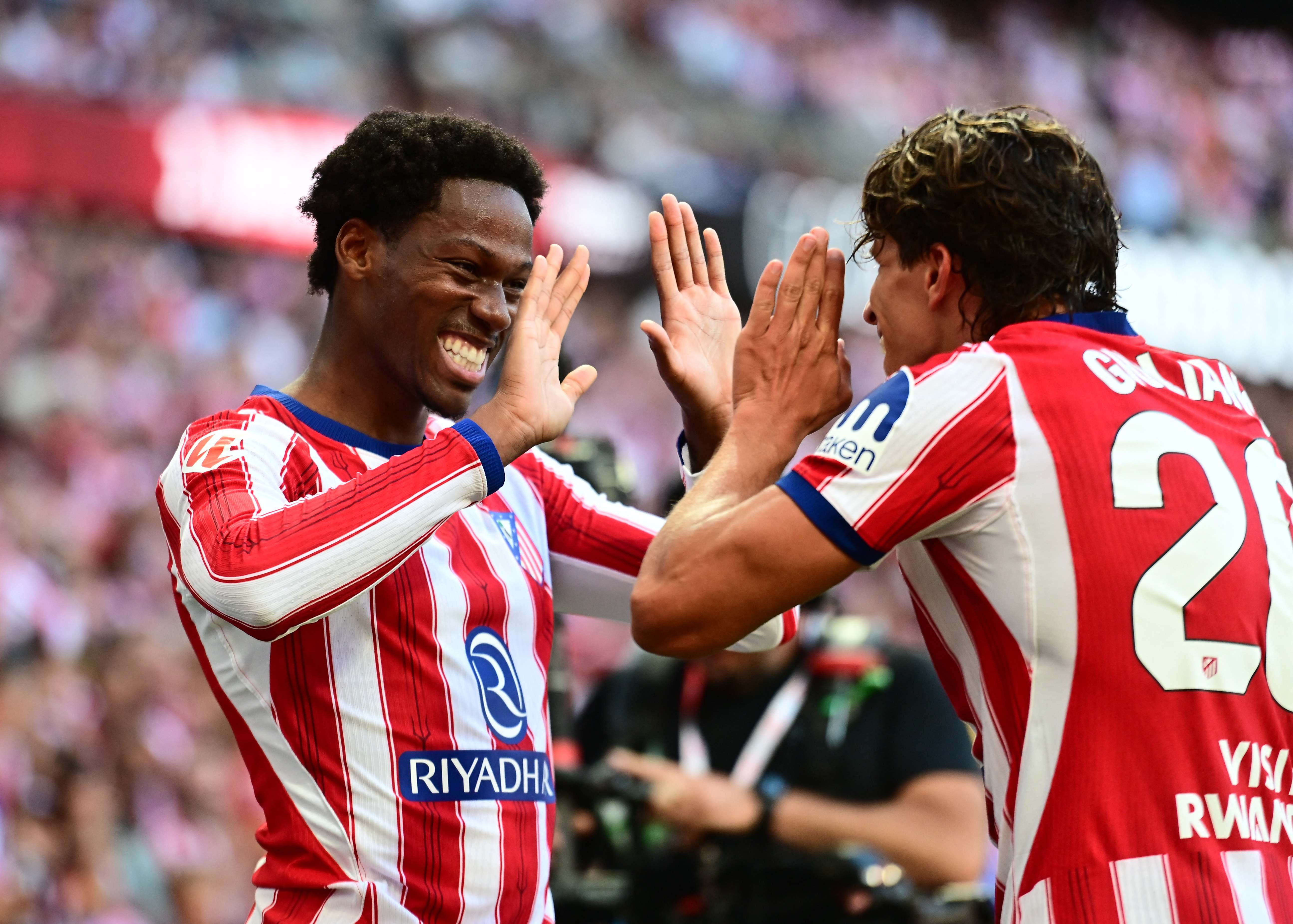 Soccer Football - LaLiga - Atletico Madrid v Real Madrid - Riyadh Air Metropolitano, Madrid, Spain - September 20, 2026 Atletico Madrid's Jonathan David celebrates scoring their second goal with Giuliano Simeone REUTERS/Juan Barbosa